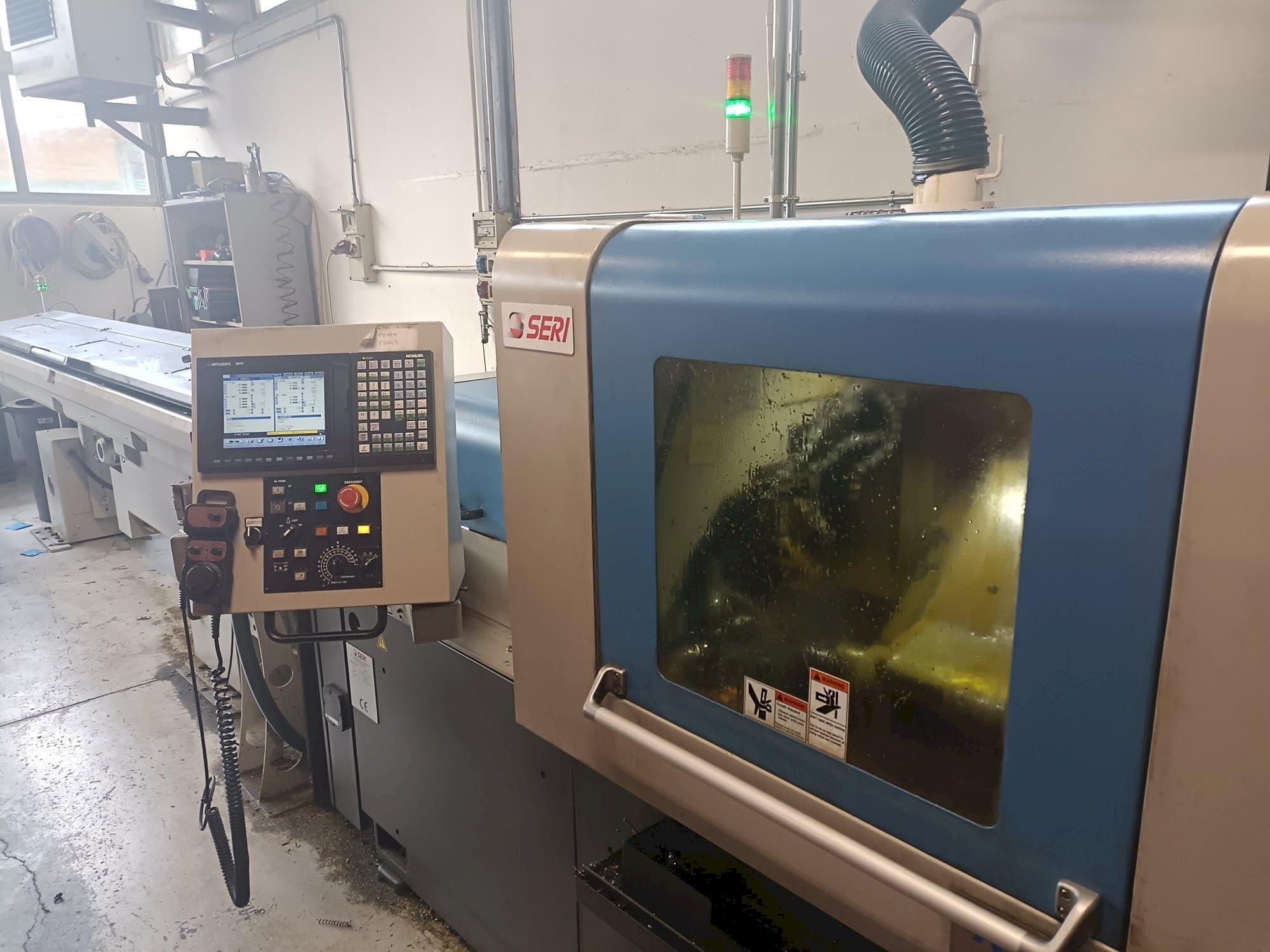 Vooraanzicht  van NOMURA   machine