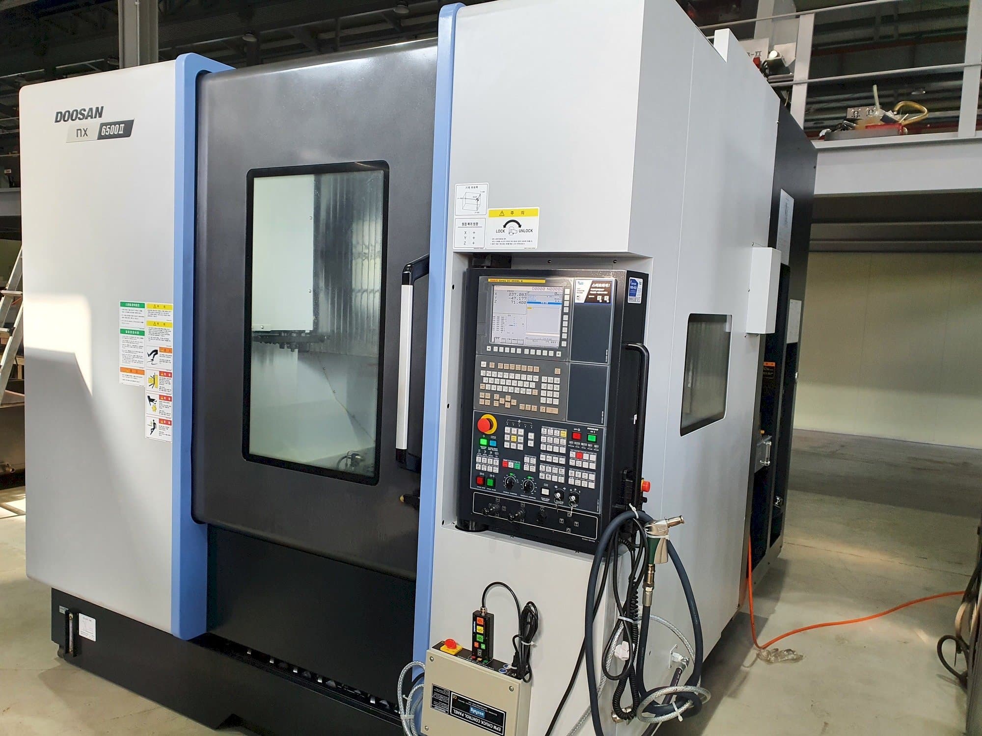 Vooraanzicht van Doosan NX6500Ⅱ machine