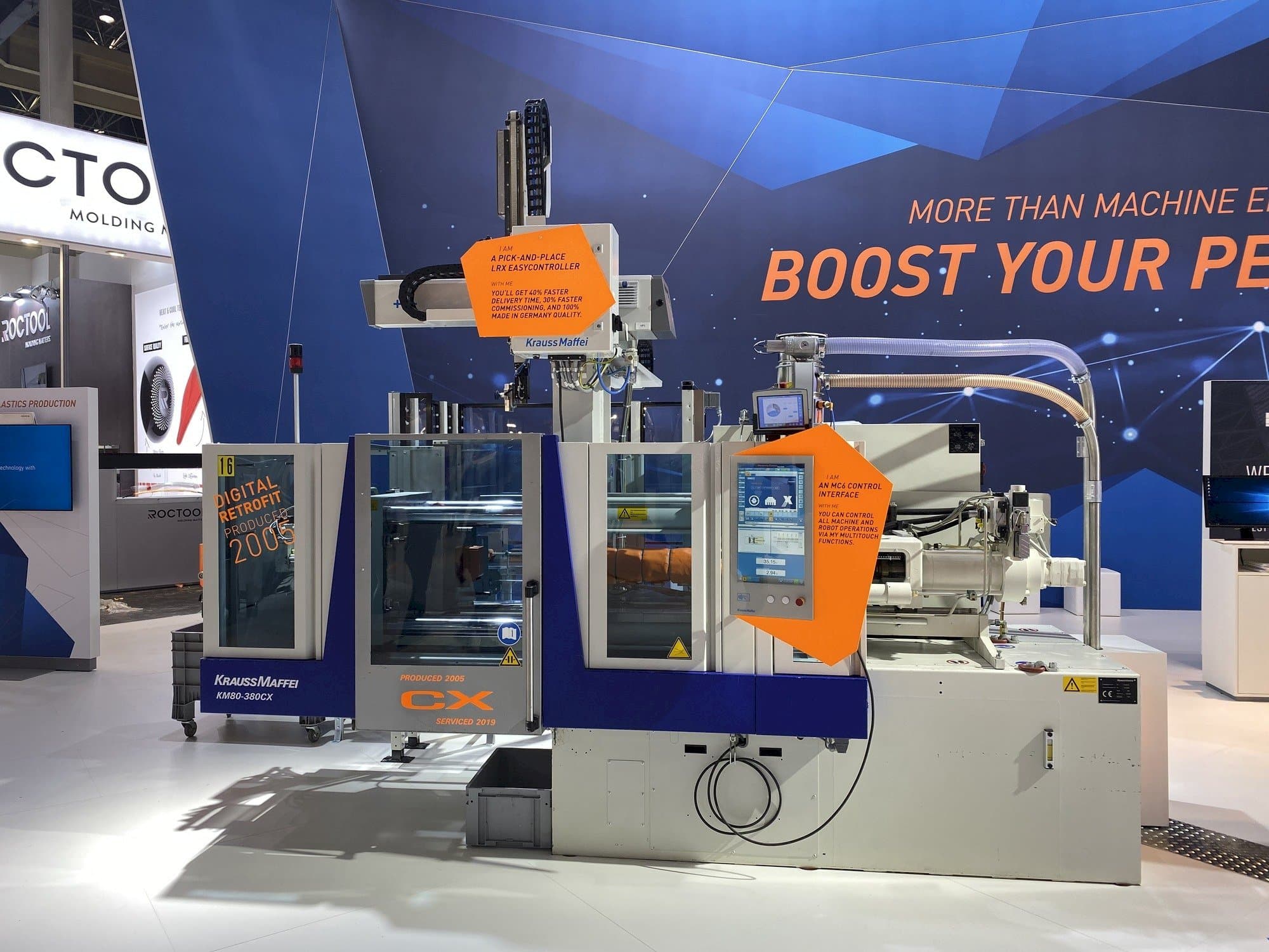 Vooraanzicht van Krauss Maffei 80-380 CX + LRX easyControl 100 machine