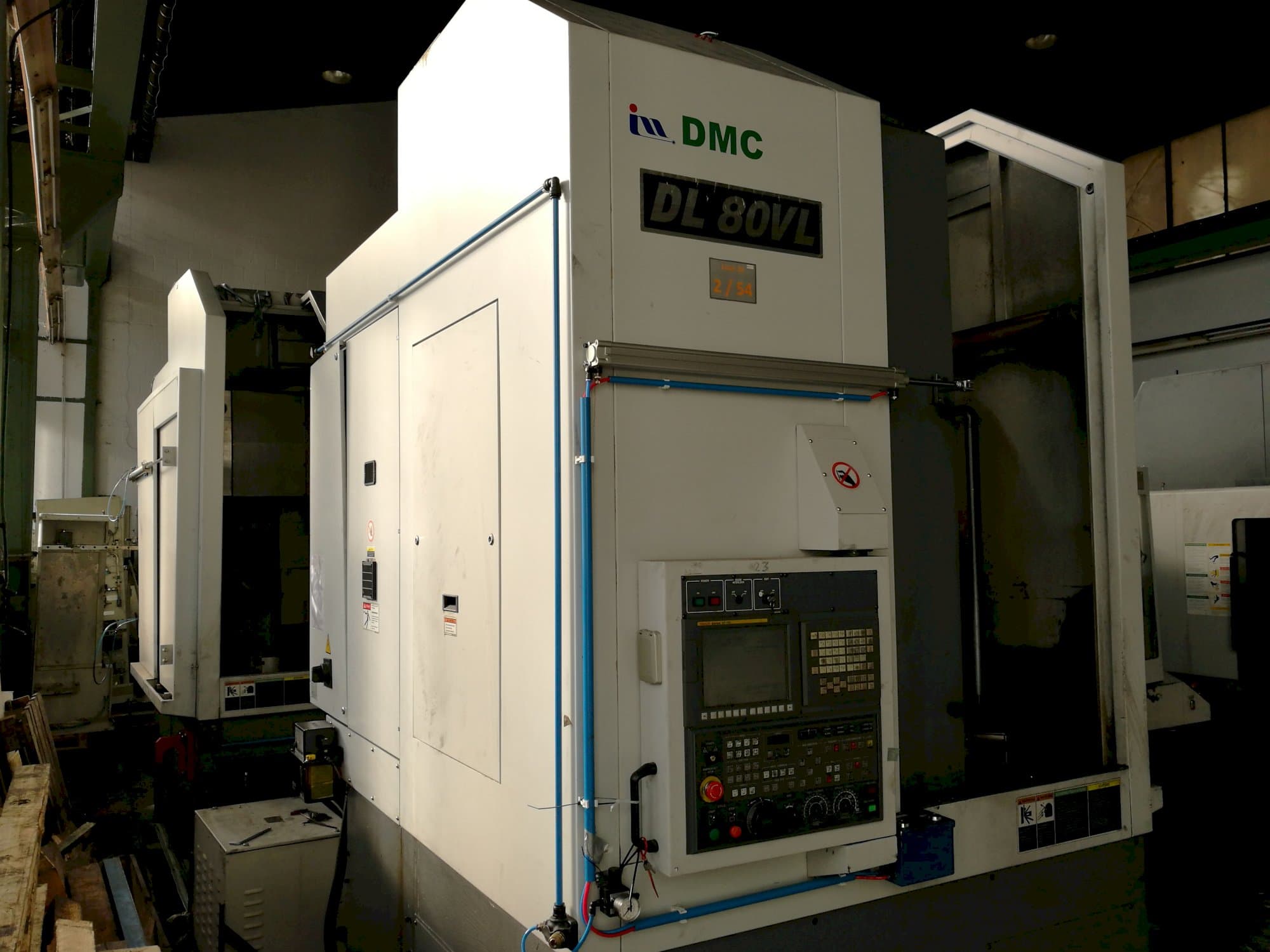 Links zicht  van DMC DL 80VL machine