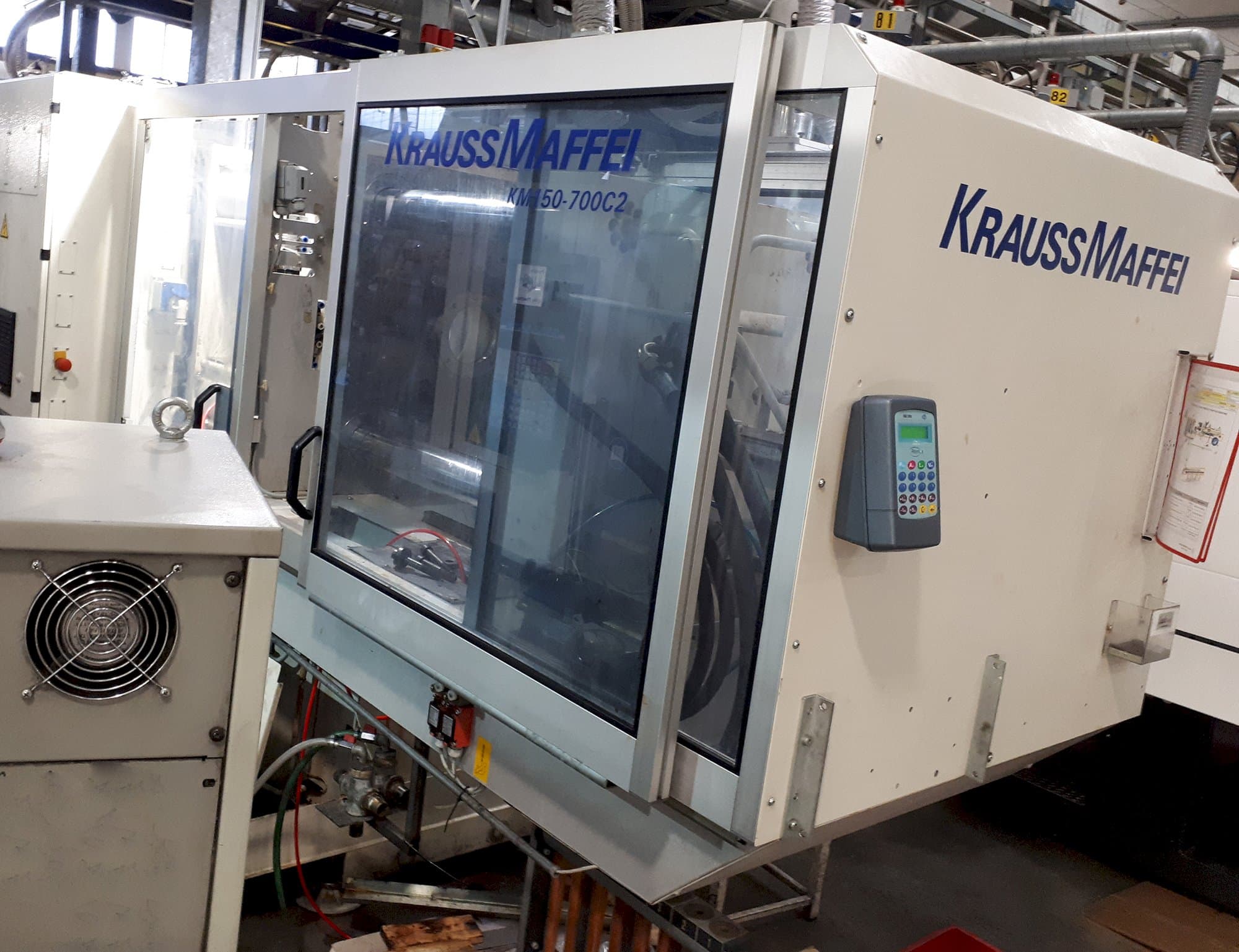 Recht aanzicht van Krauss Maffei C2 150-700 machine
