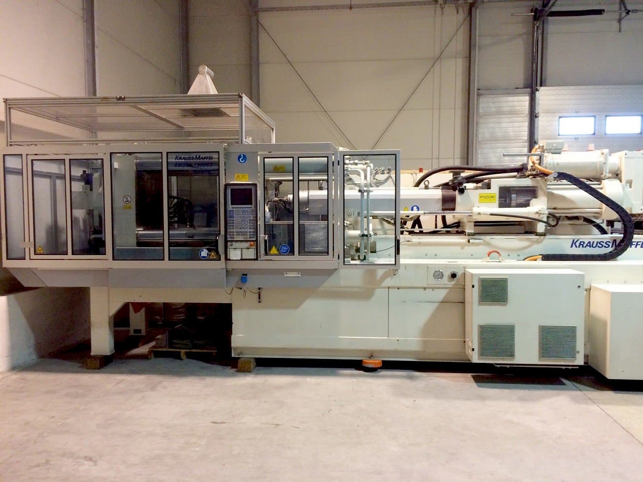 Vooraanzicht van Krauss Maffei KM 280-1900 C3 machine