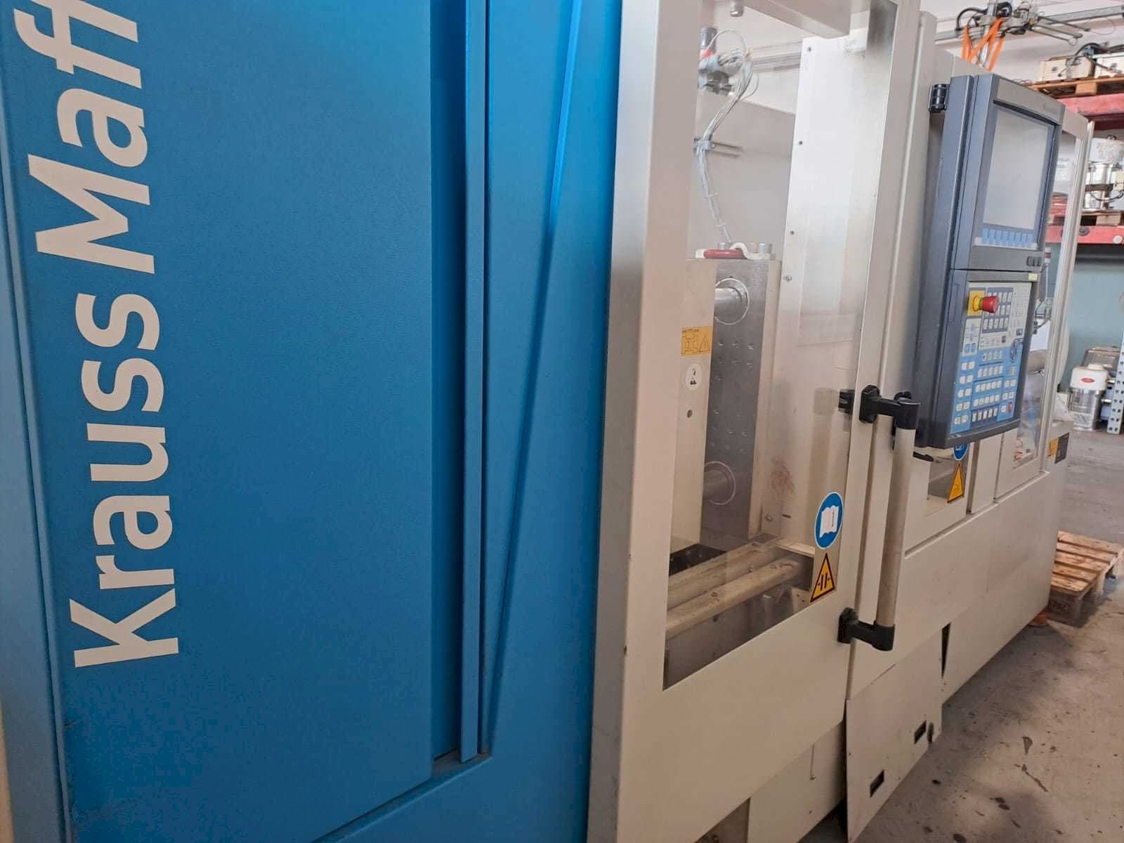 Vooraanzicht van Krauss Maffei 35-180CX machine