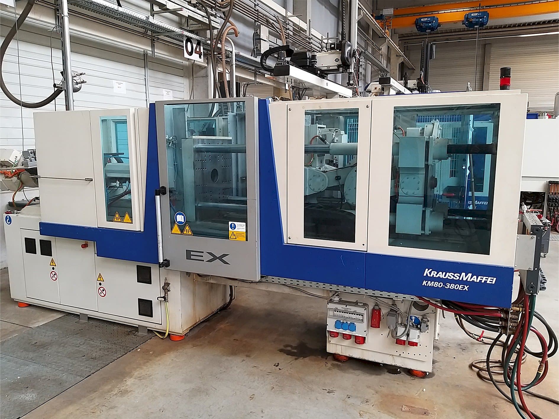 Vooraanzicht van Krauss Maffei 80-380 Ex machine