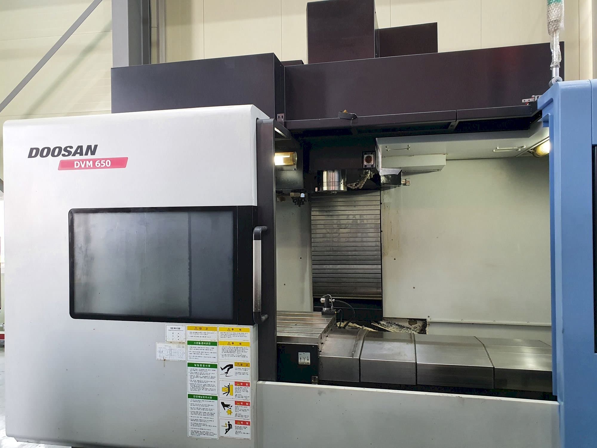 Vooraanzicht van Doosan DVM 650 machine