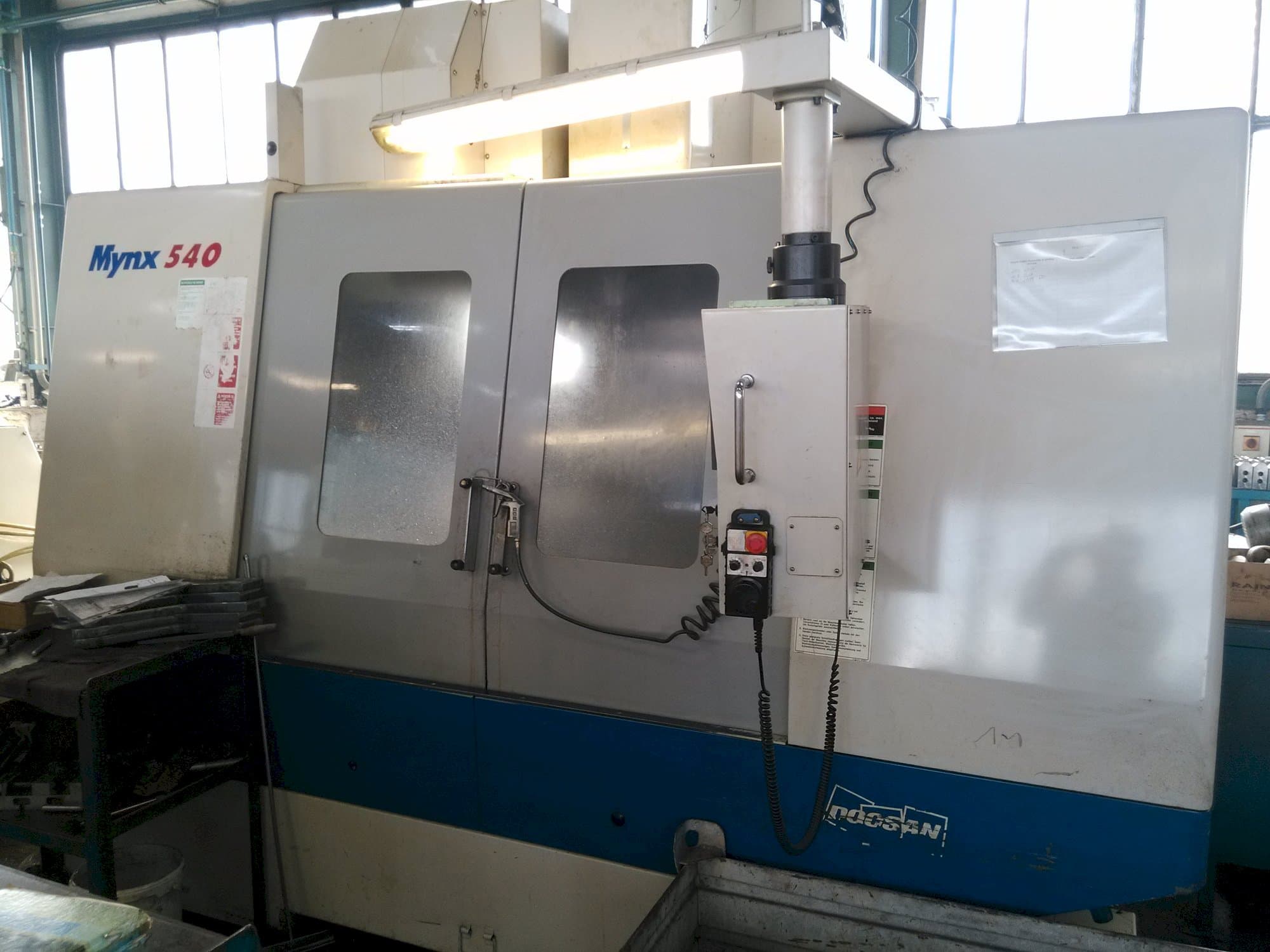 Vooraanzicht van Doosan Mynx 540 machine