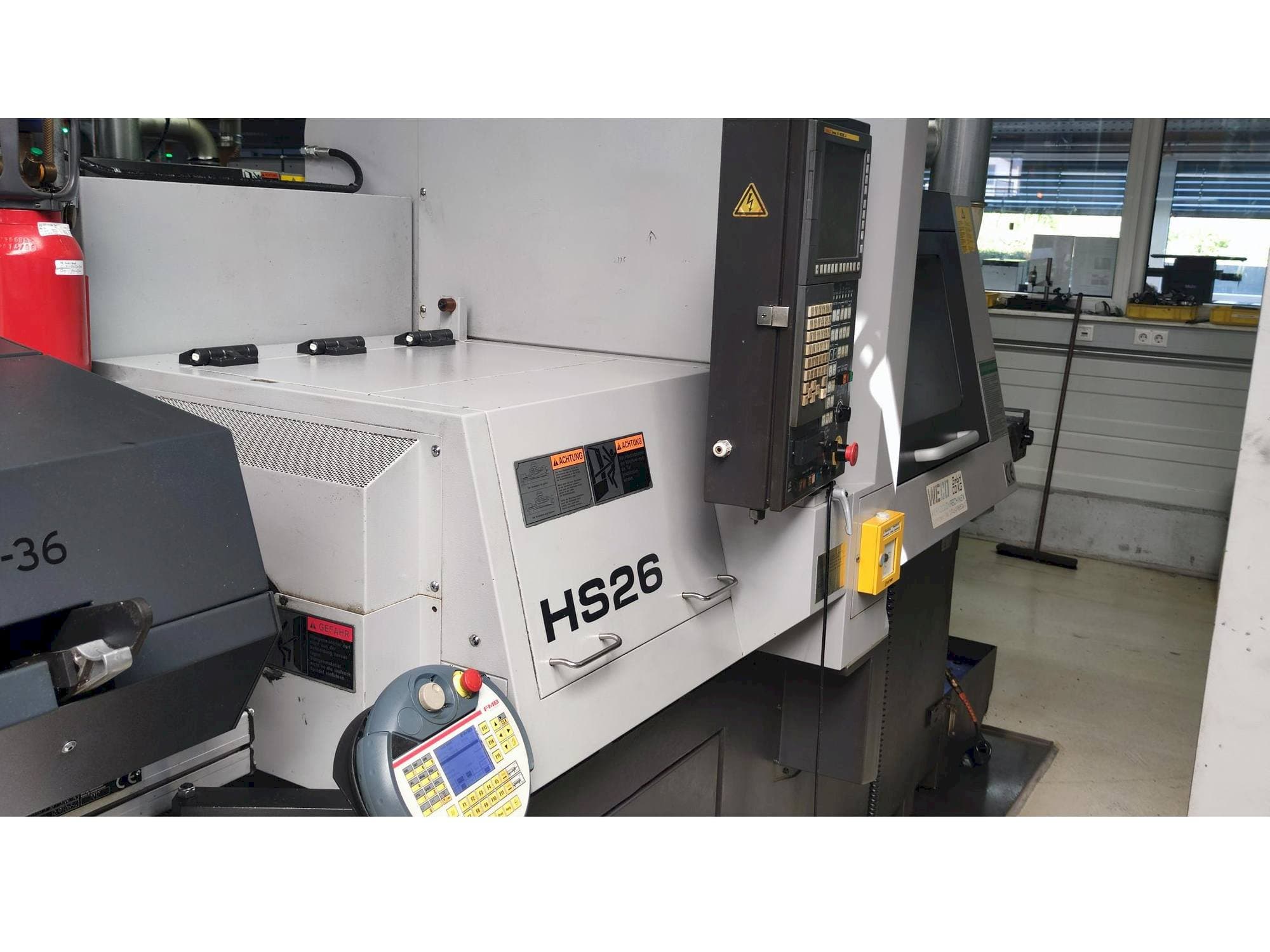 Linkerzijdeaanzicht van TSUGAMI HS26 machine