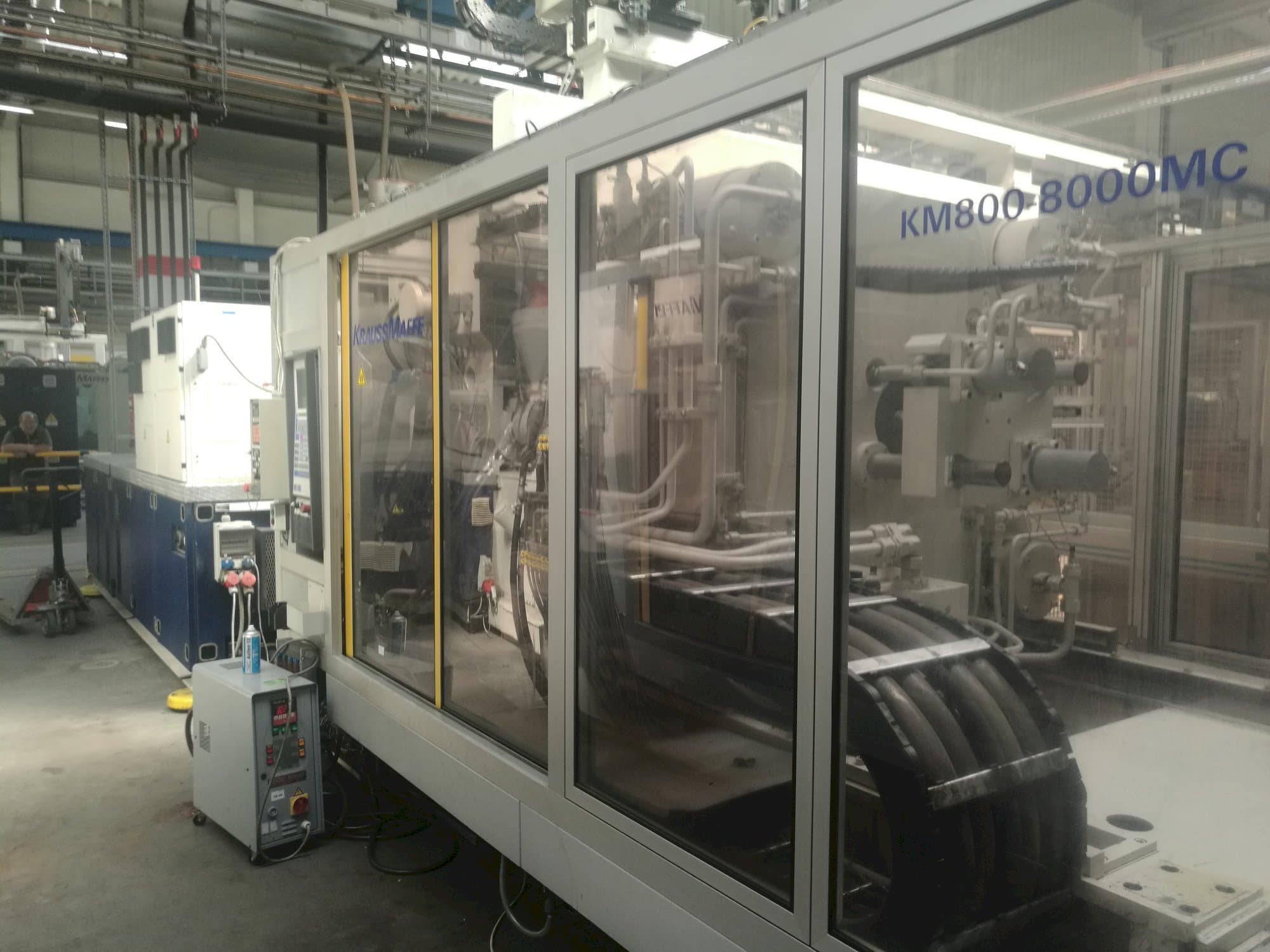 Vooraanzicht van Krauss Maffei 800-8000 MC machine