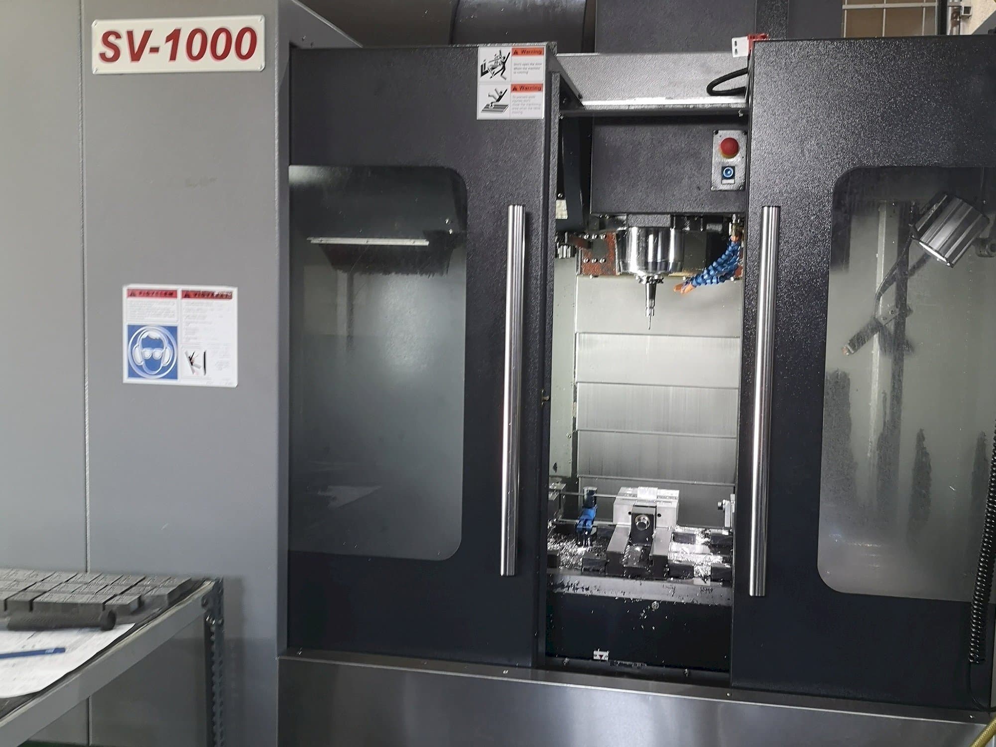 Vooraanzicht van NCT KAFO SV-1000 machine