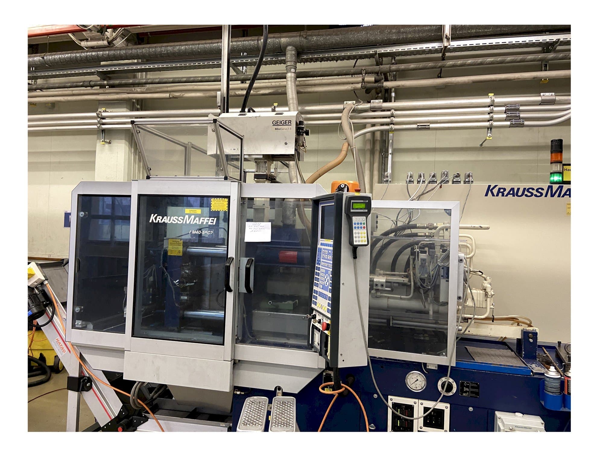 Vooraanzicht van Krauss Maffei 40-55 C2 machine