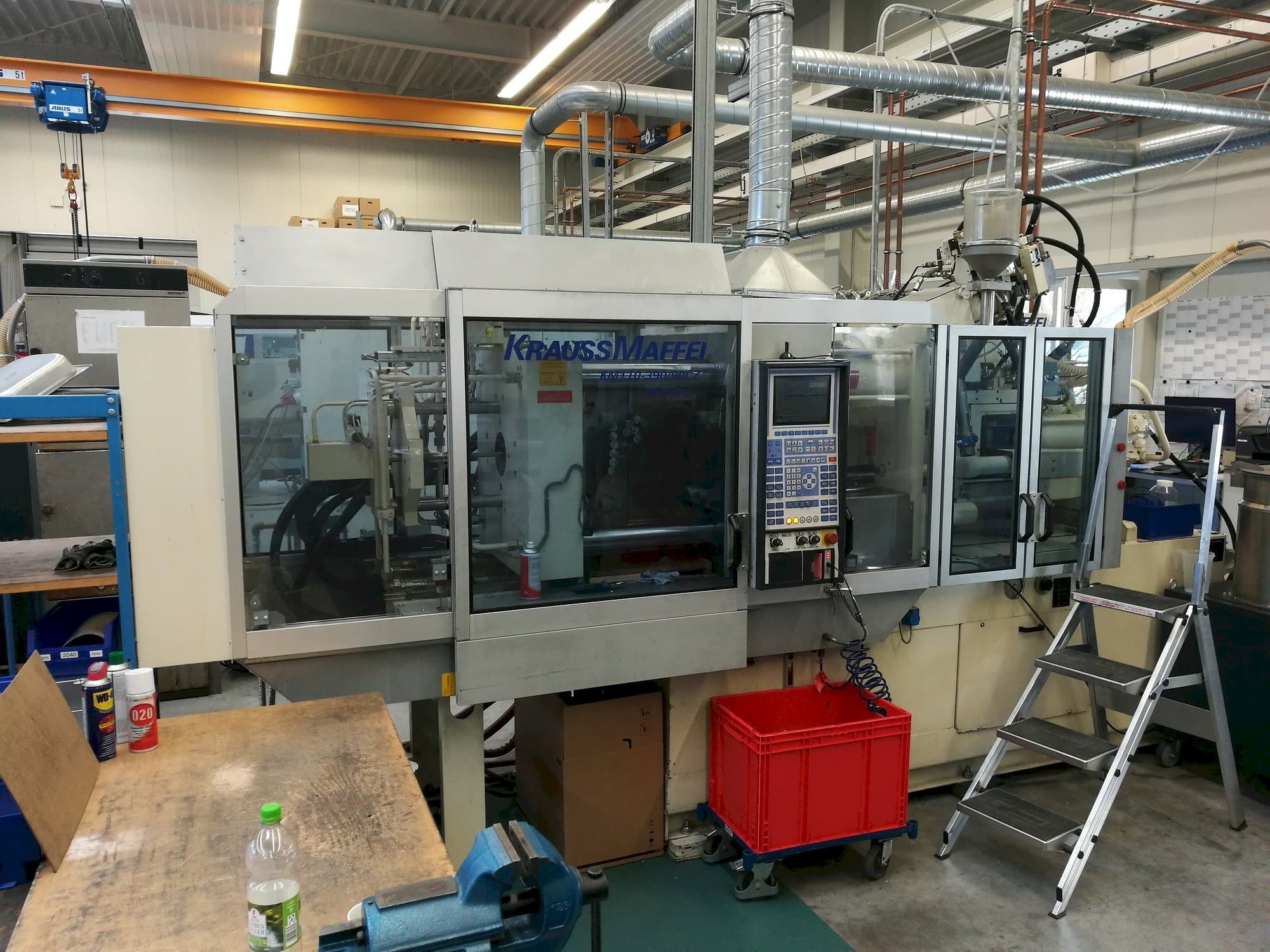 Vooraanzicht van Krauss Maffei 110-390/90 CZ machine