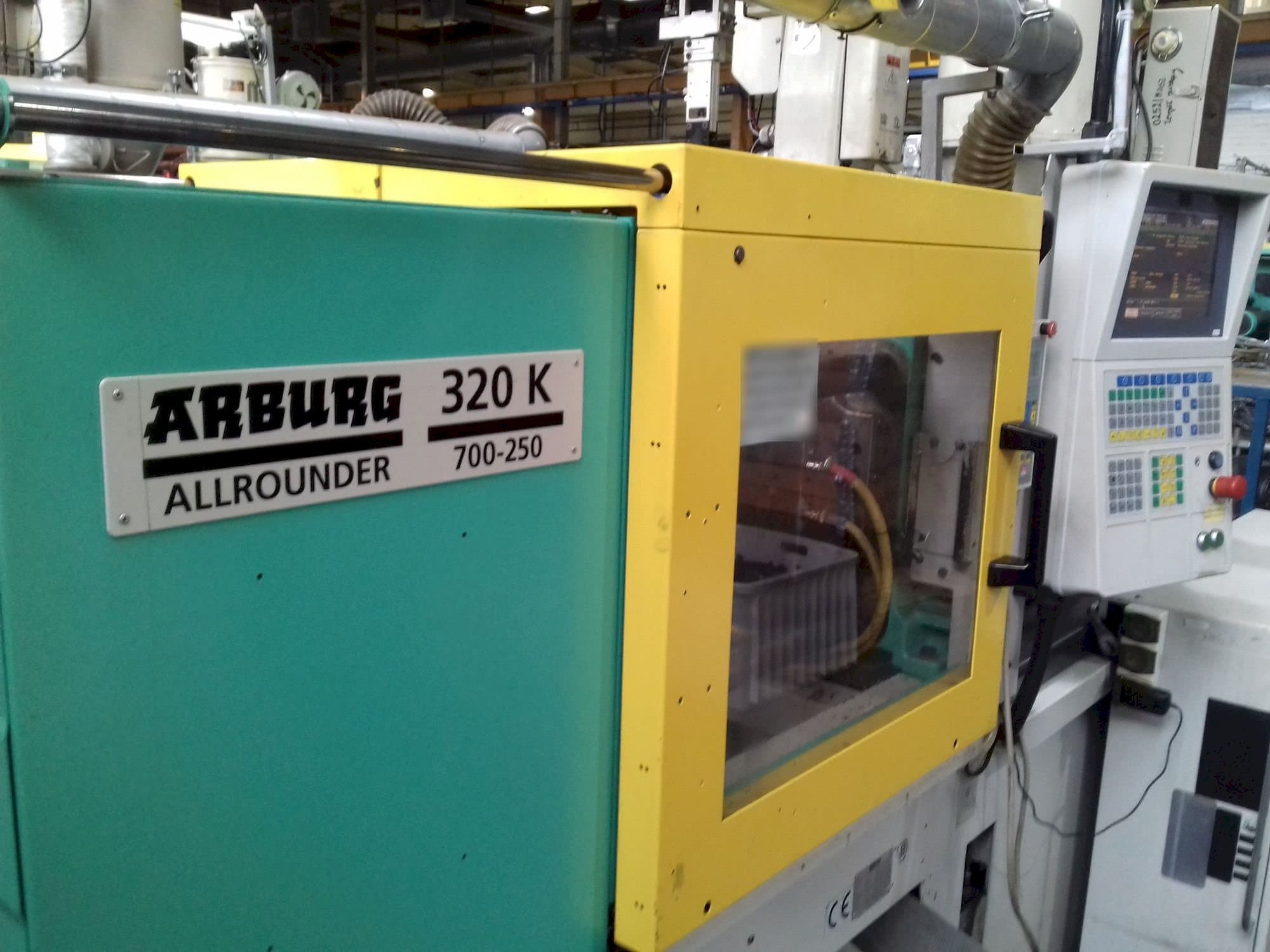 Vooraanzicht  van Arburg ALLROUNDER 320 K 700-250  machine