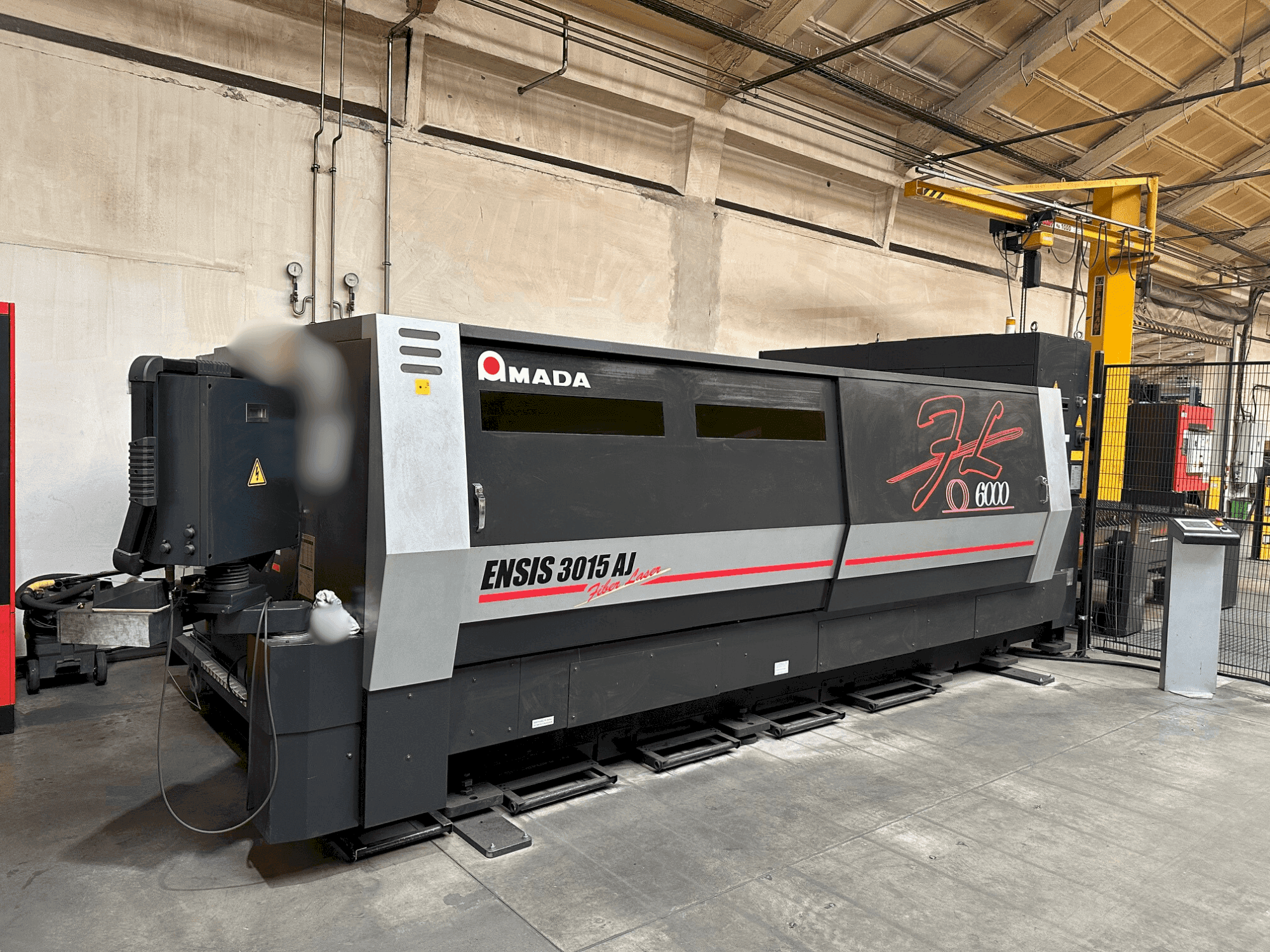 Vooraanzicht van AMADA ENSIS-3015 AJ machine