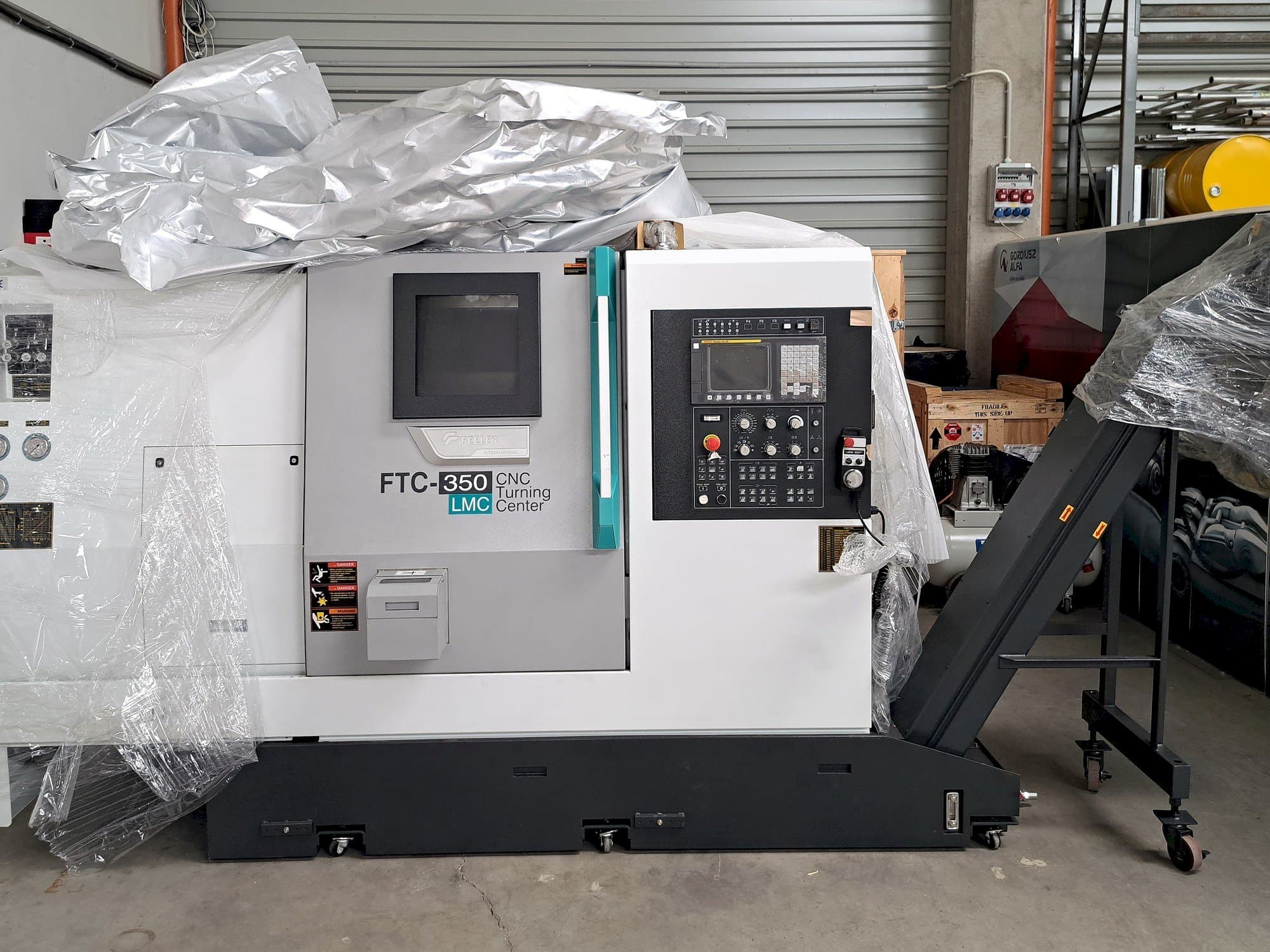 Vooraanzicht van Feeler FTC 350 LMC machine