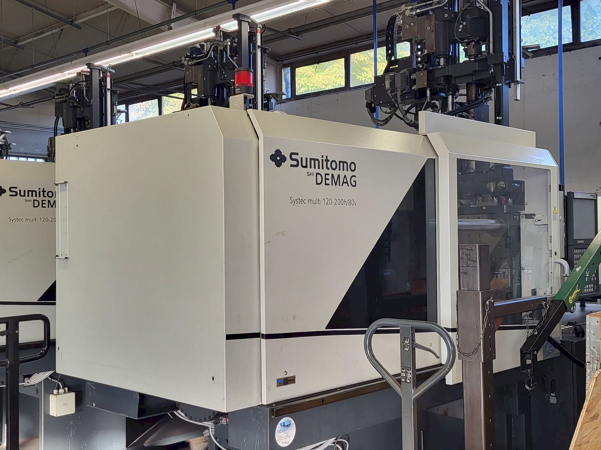 Linkerzijdeaanzicht van Sumitomo SHI DEMAG Multi 120/470-200h/80V machine