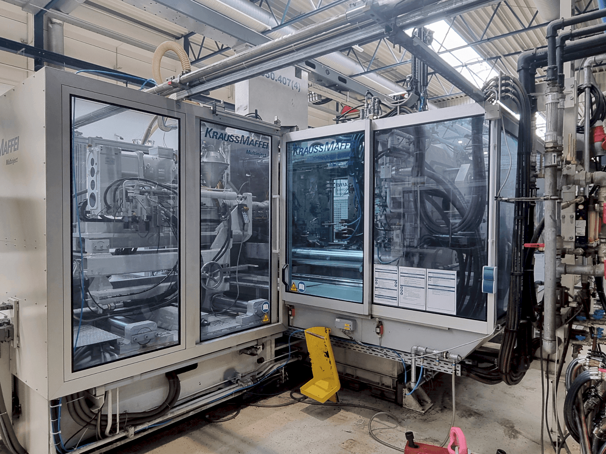 Vooraanzicht van Krauss Maffei 650-2700-390 CL machine