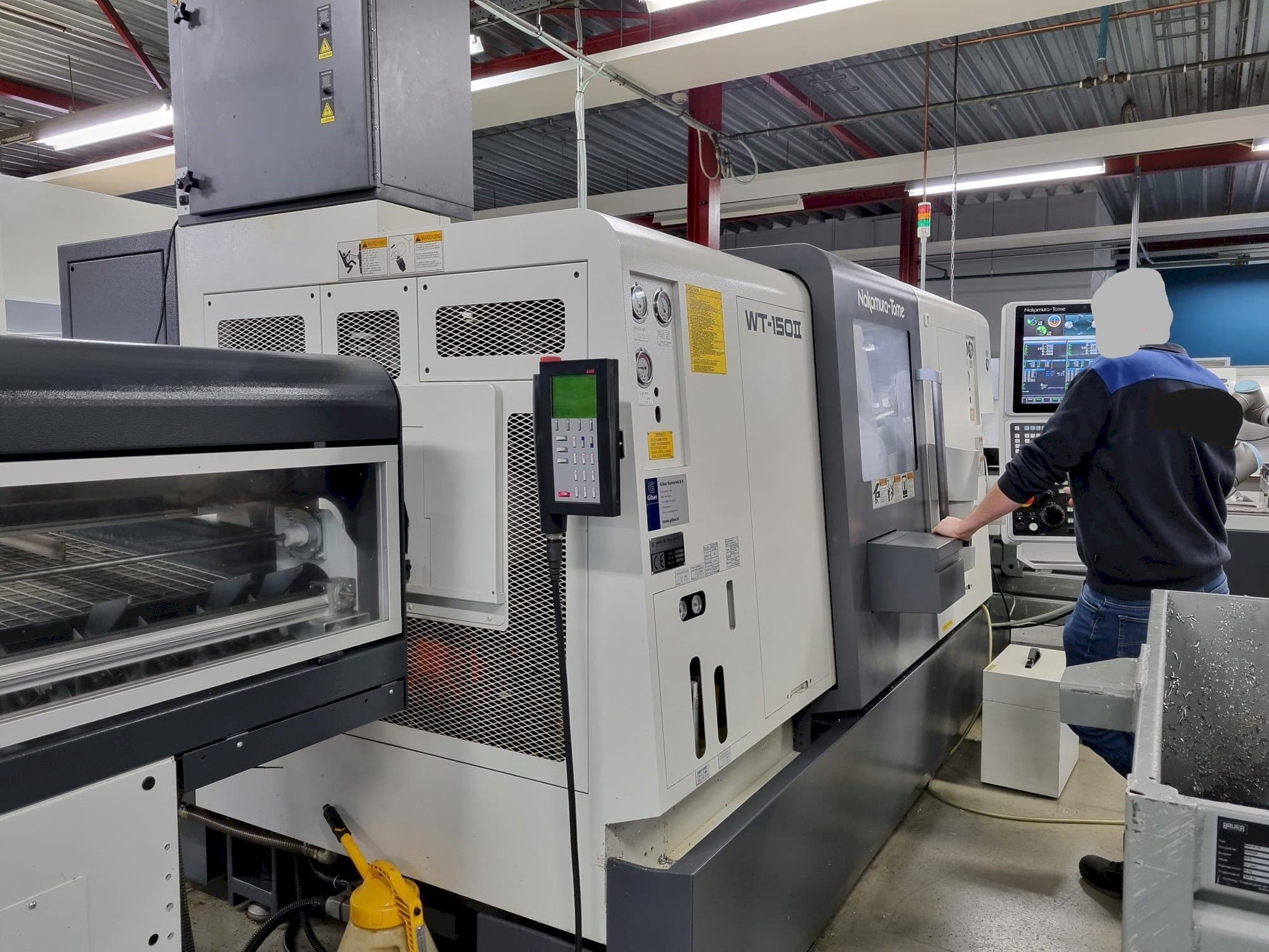 Vooraanzicht van NAKAMURA-TOME WT-150II machine