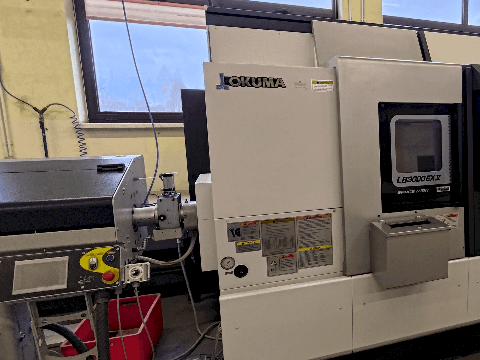 Vooraanzicht van Okuma LB 3000 EXII MYW 450 machine