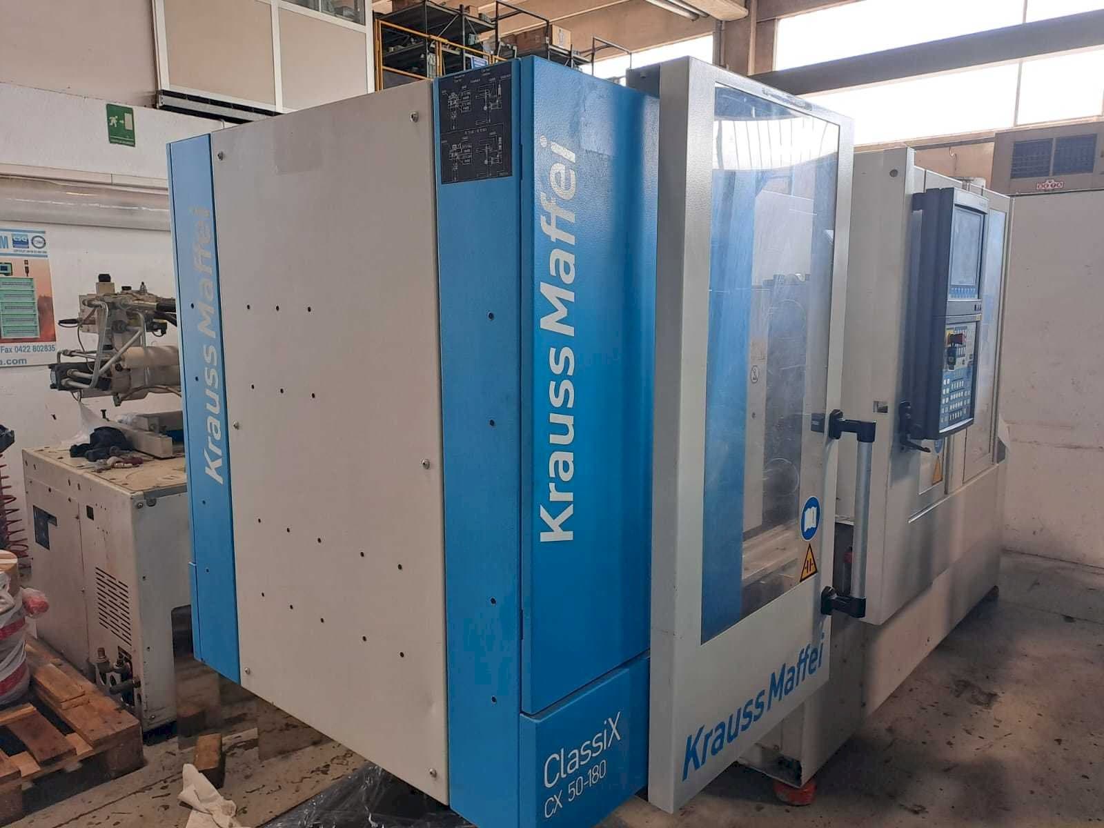 Links zicht van Krauss Maffei 50-180CX machine