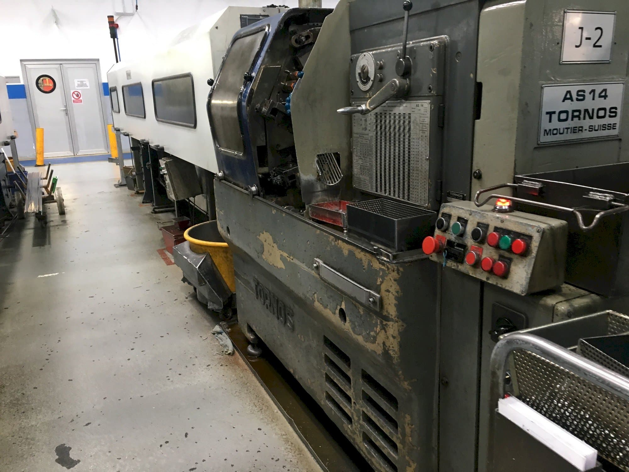 Vooraanzicht van Tornos-Moutier Suisse AS 14 machine