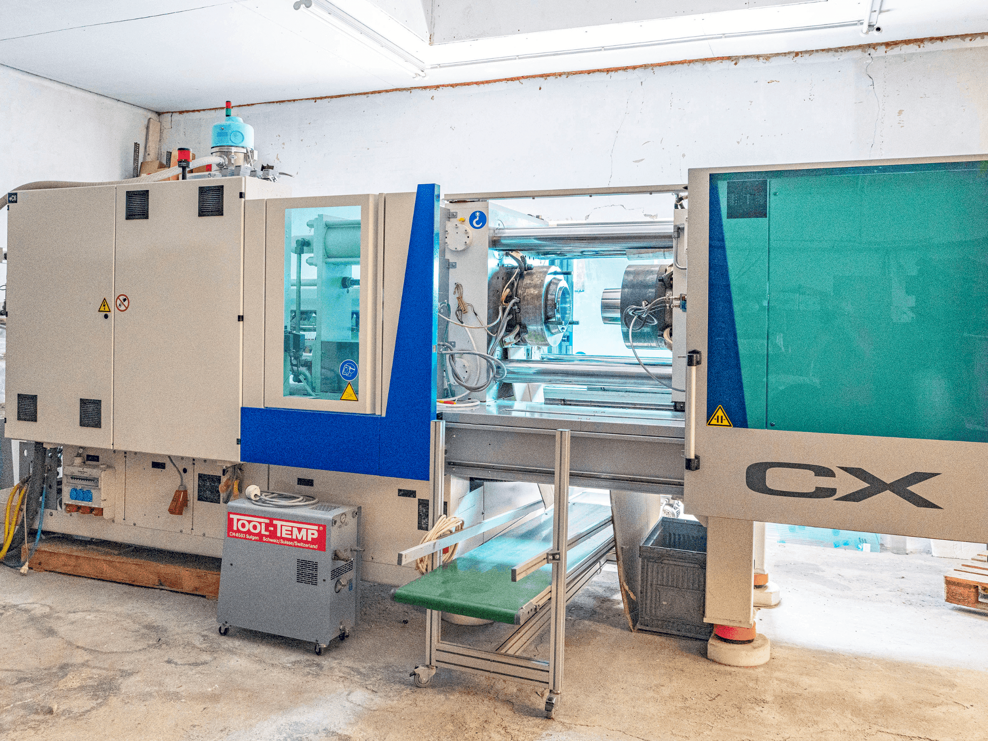 Vooraanzicht van Krauss Maffei KM 200 CX 1400 MC5 machine