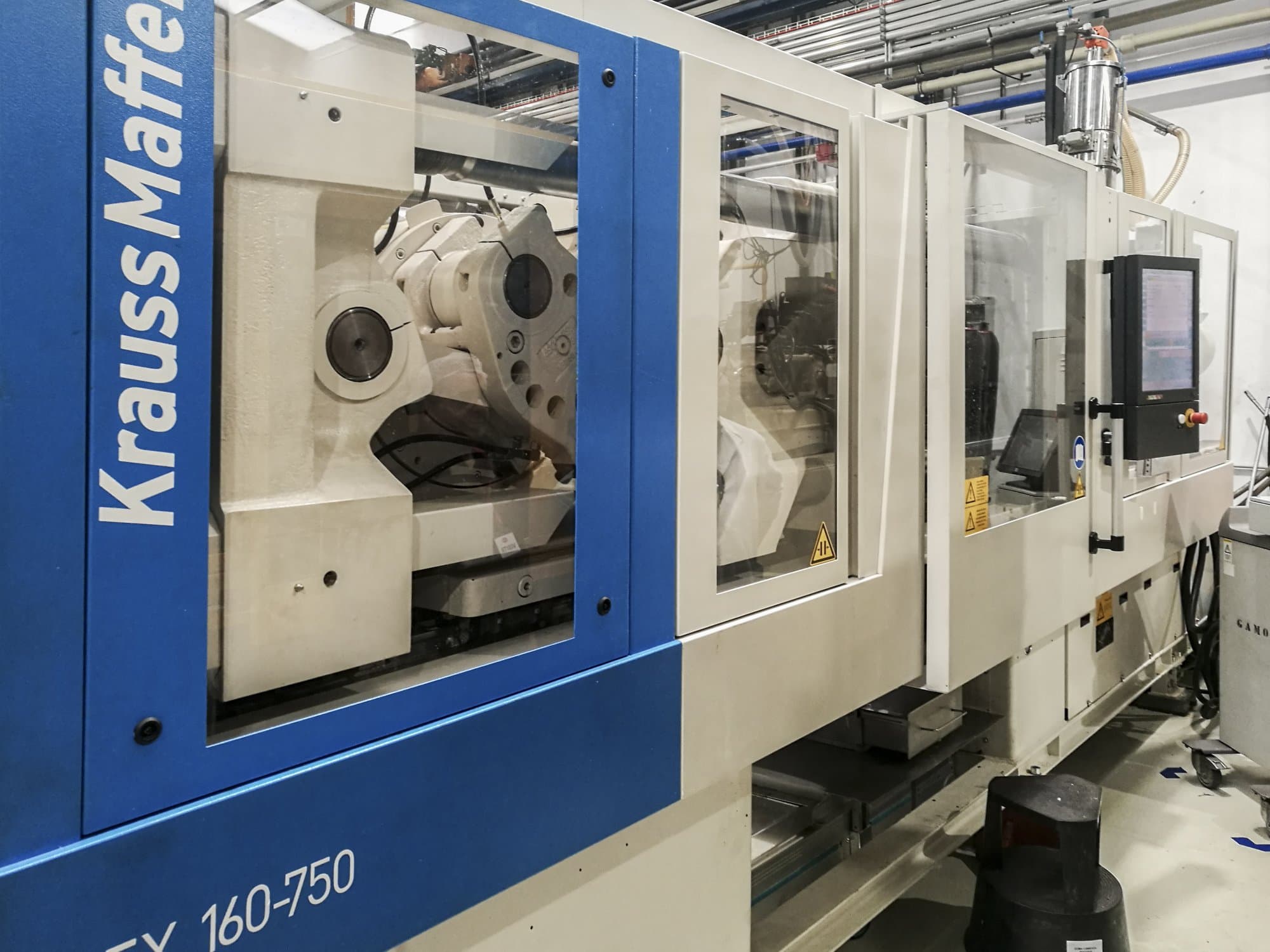 Links zicht van Krauss Maffei 160-750 EX machine