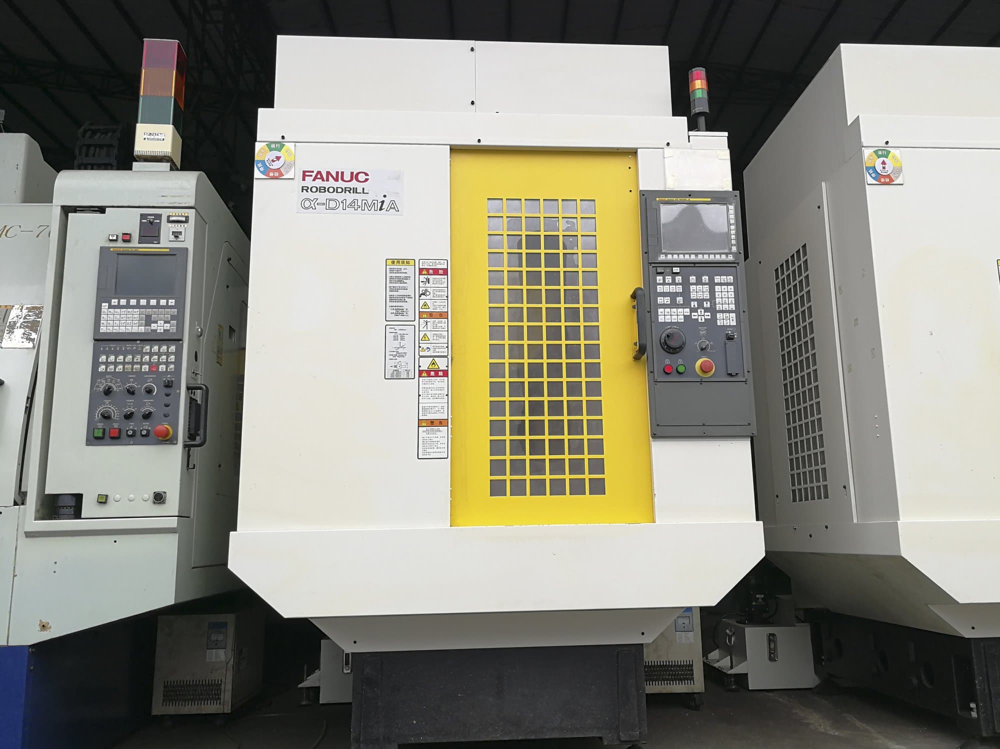 Vooraanzicht van FANUC α-D14MiA machine