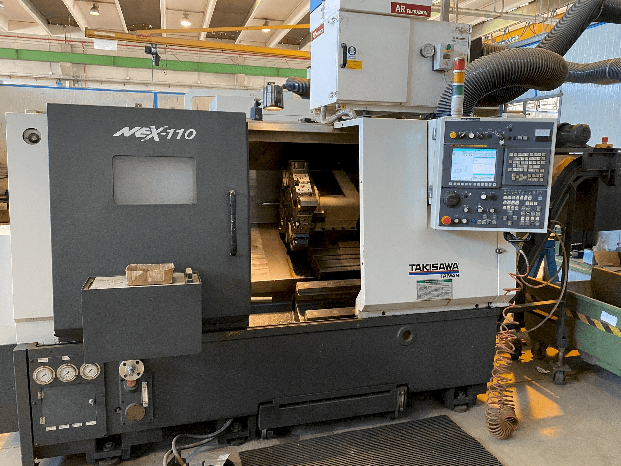 Vooraanzicht van Takisawa NEX-110 machine