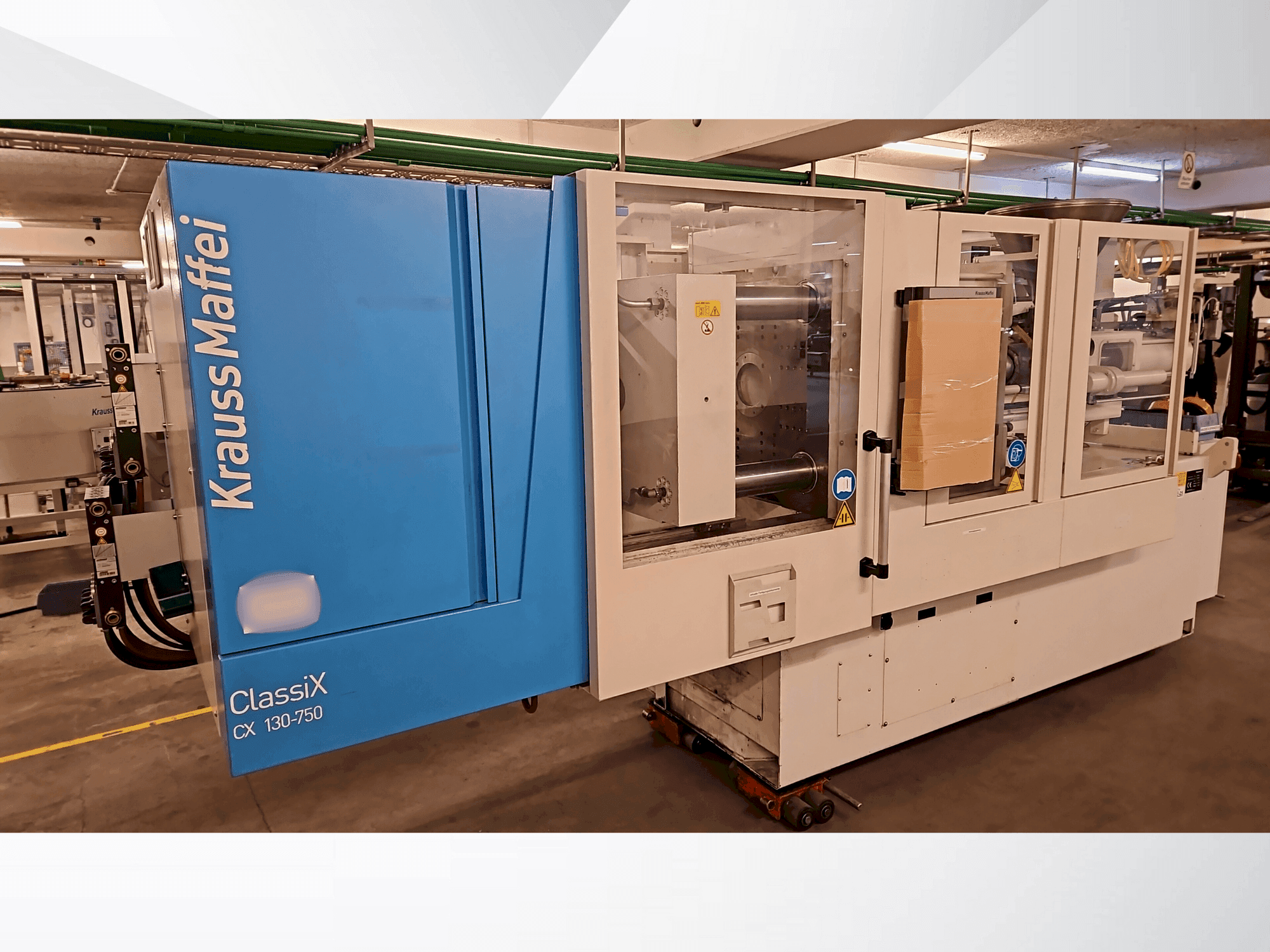 Vooraanzicht van Krauss Maffei 130-750 CX machine