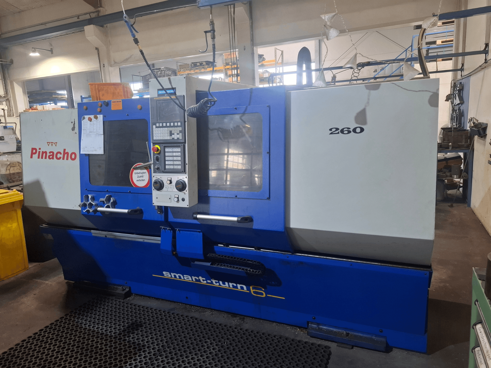 Pinacho Smart-turn6 260 horizontale draaimachine, vooraanzicht met zichtbaar bedieningspaneel en labels.