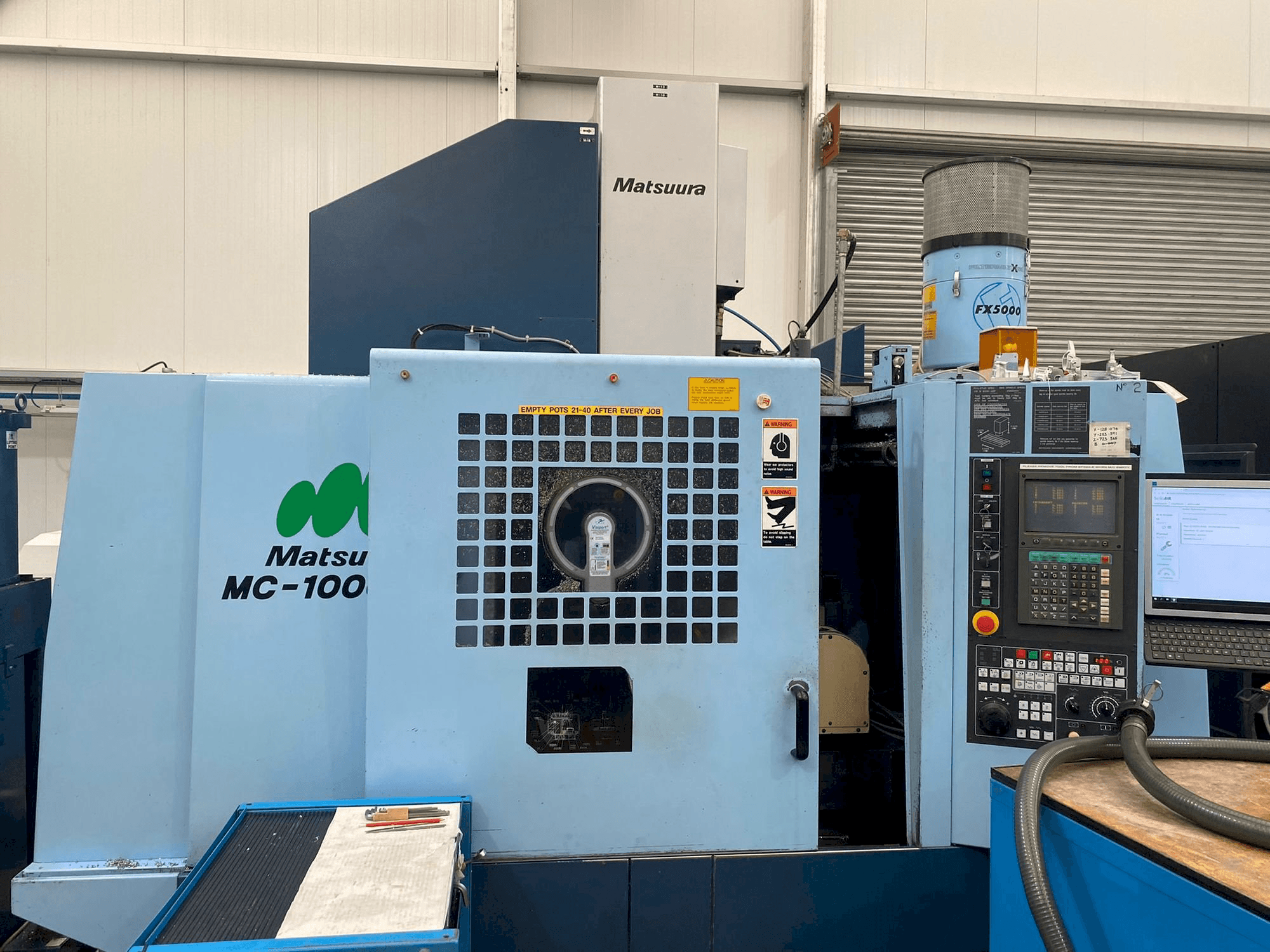 Vooraanzicht van Matsuura MC-1000 VGX machine