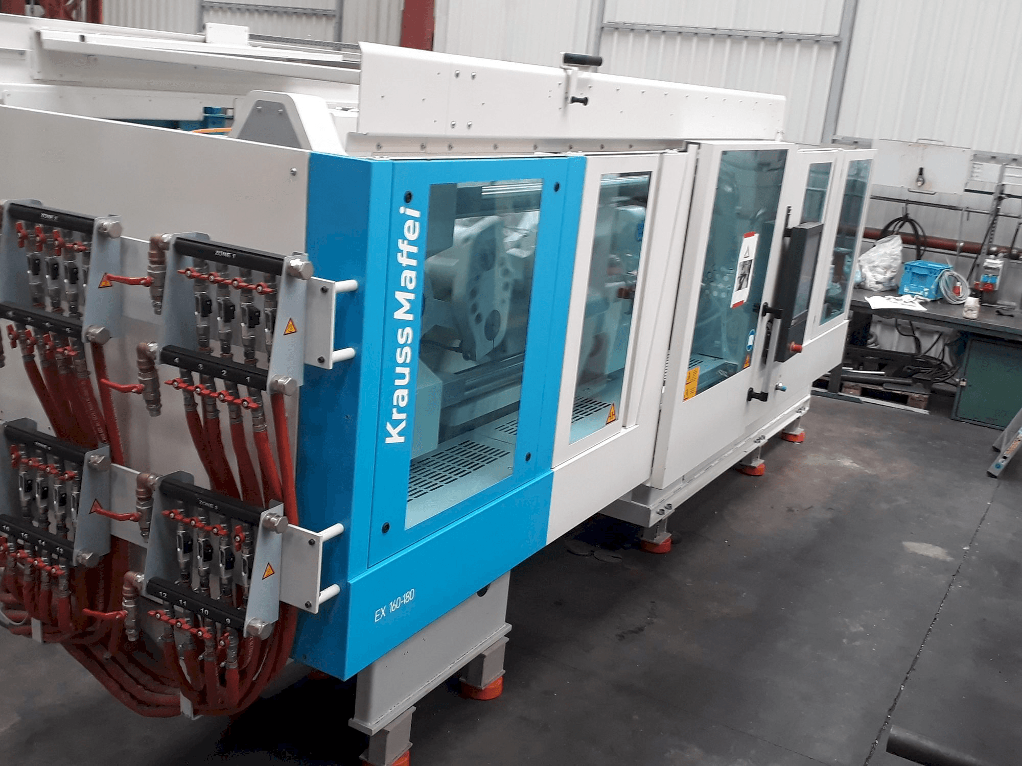 Linkerzijdeaanzicht van Krauss Maffei 160-180 EX machine