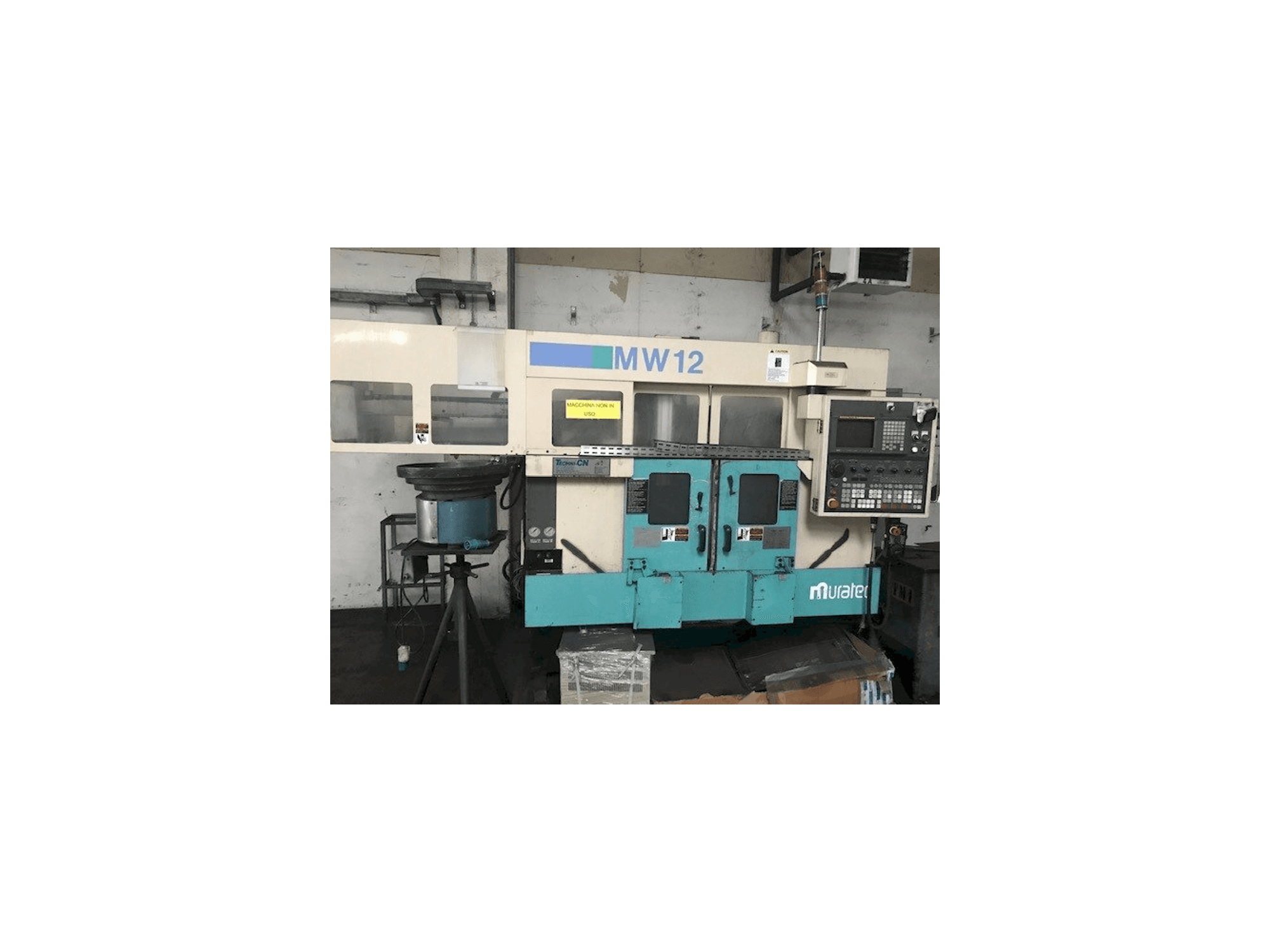 Vooraanzicht van Muratec MW 12 CNC machine