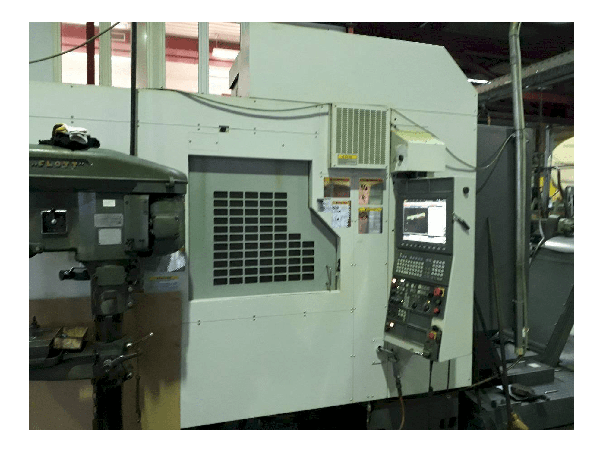Vooraanzicht van Okuma ACE Center MF-46VA machine