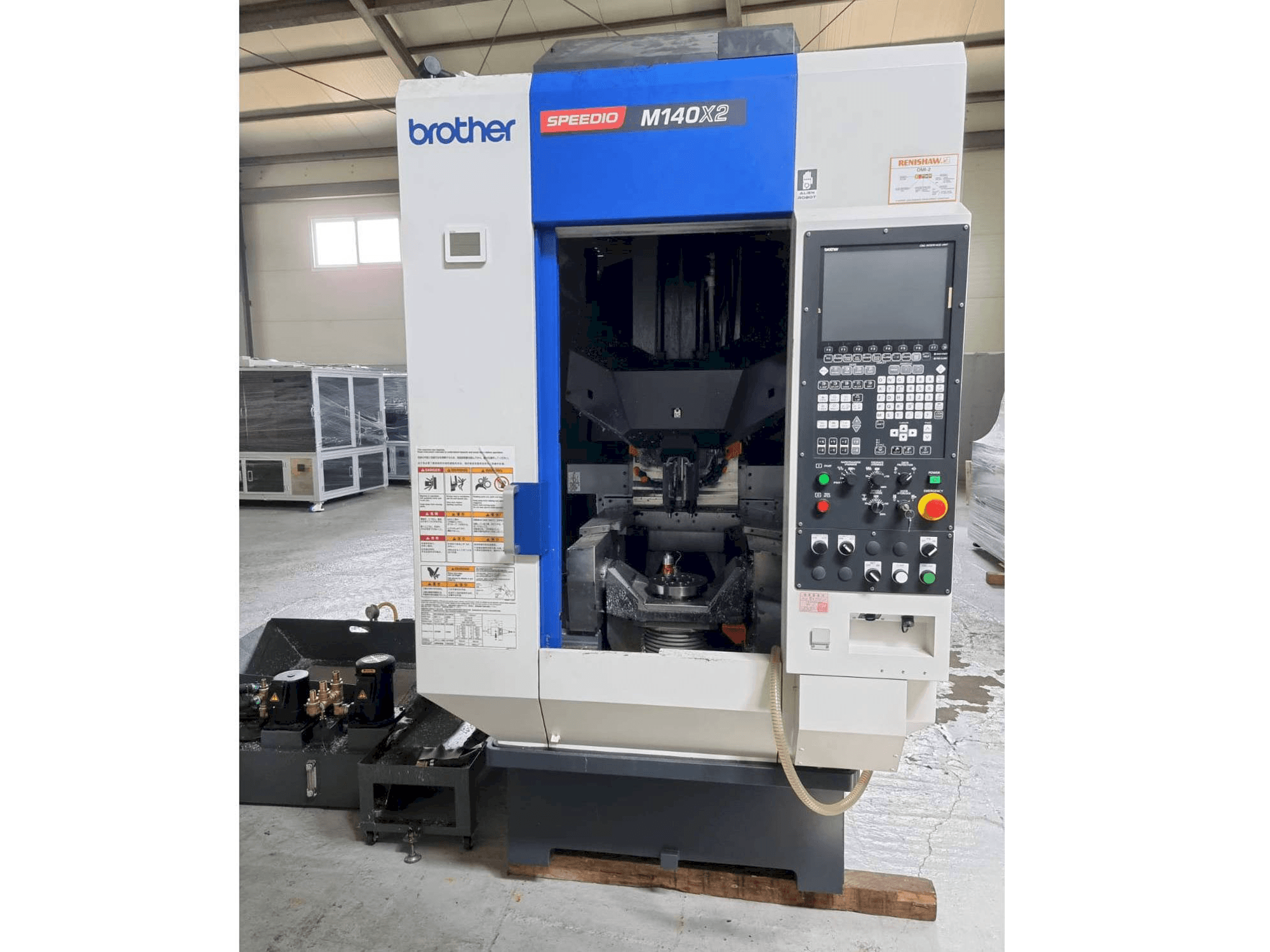 Vooraanzicht van Brother SPEEDIO M140X2 machine