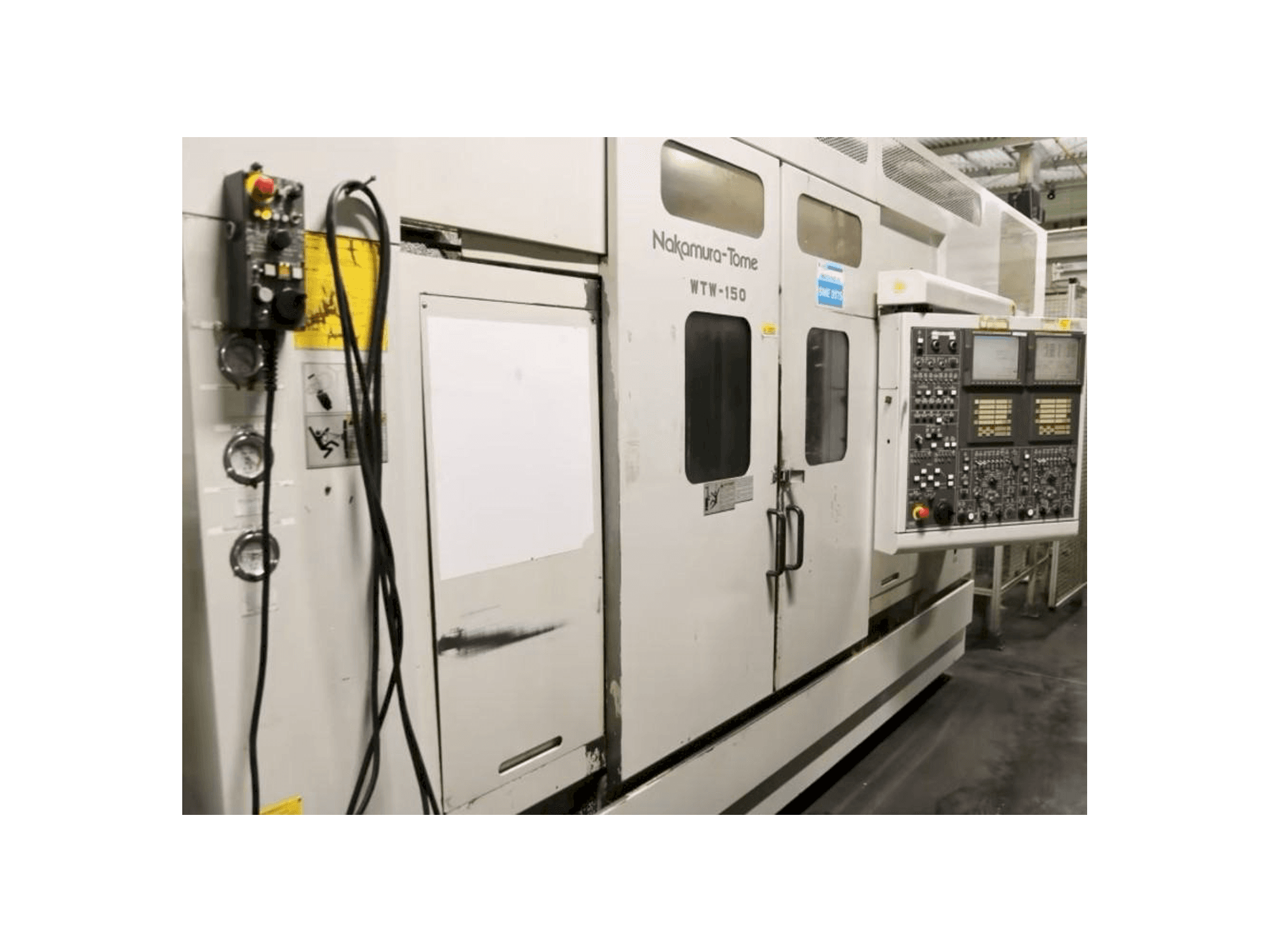 Links zicht van NAKAMURA-TOME WTW-150 machine