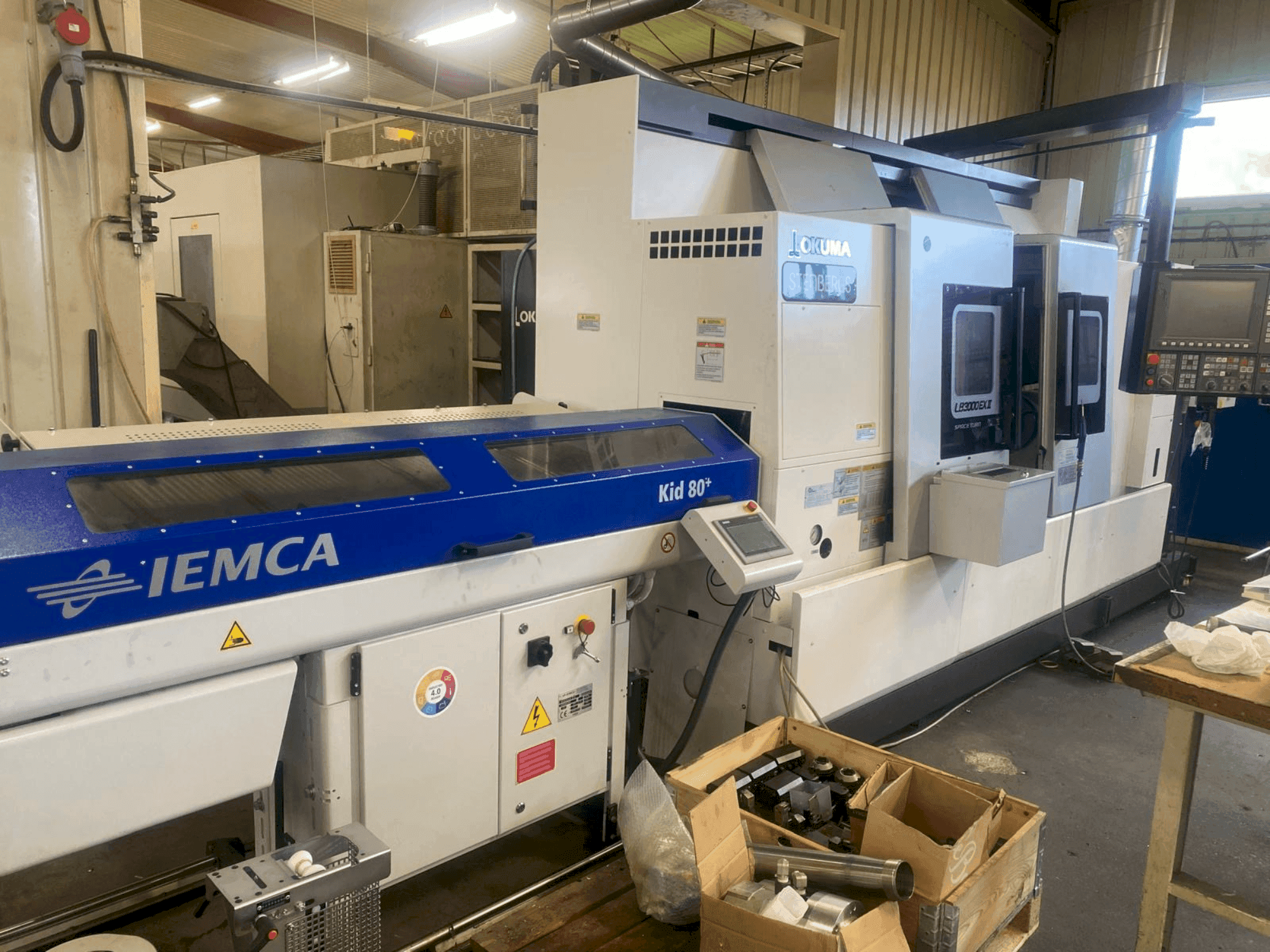 Vooraanzicht van Okuma LB 3000 EX II with Iemca KID 80 machine