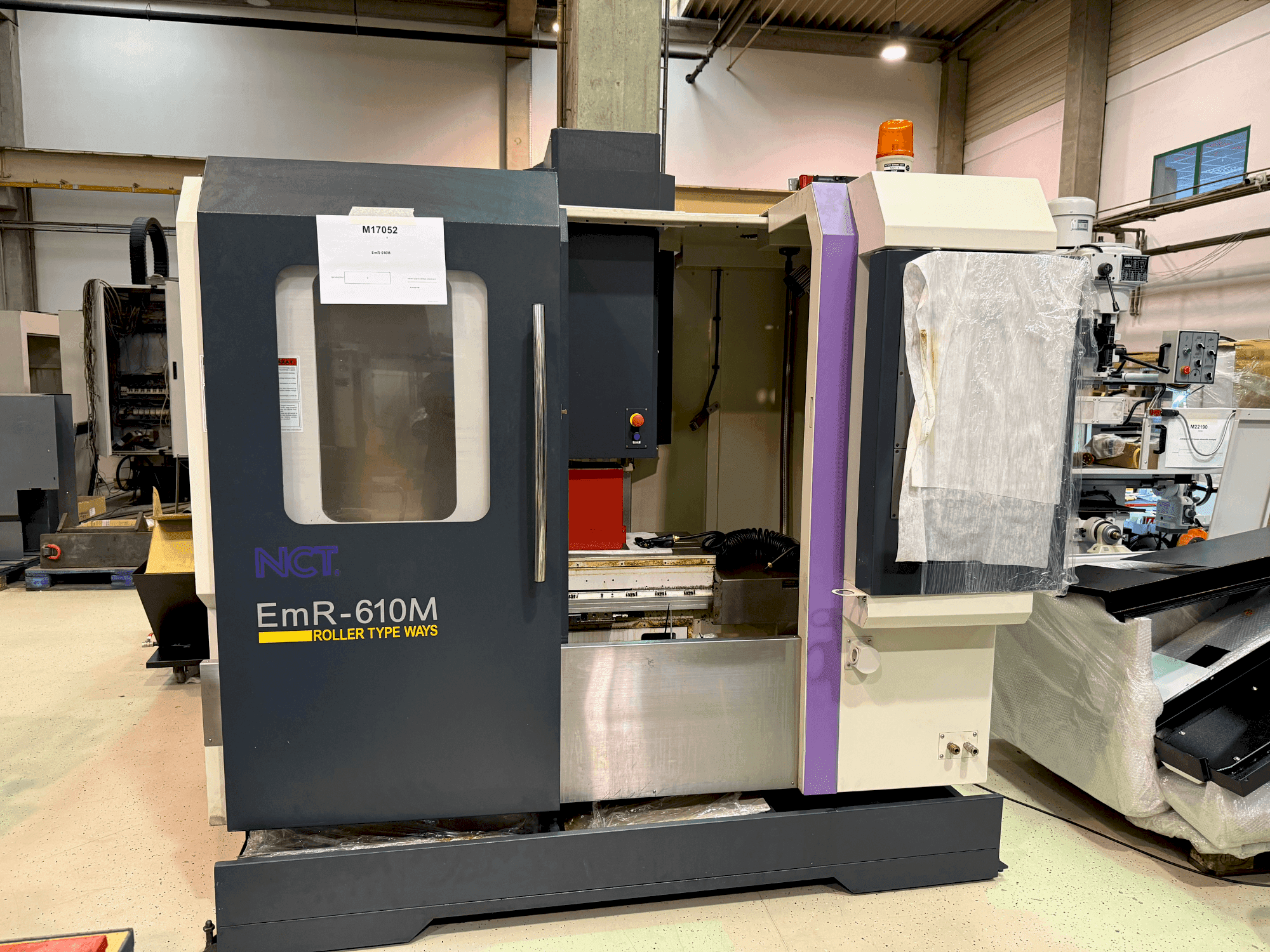 Vooraanzicht van NCT EmR-610M machine