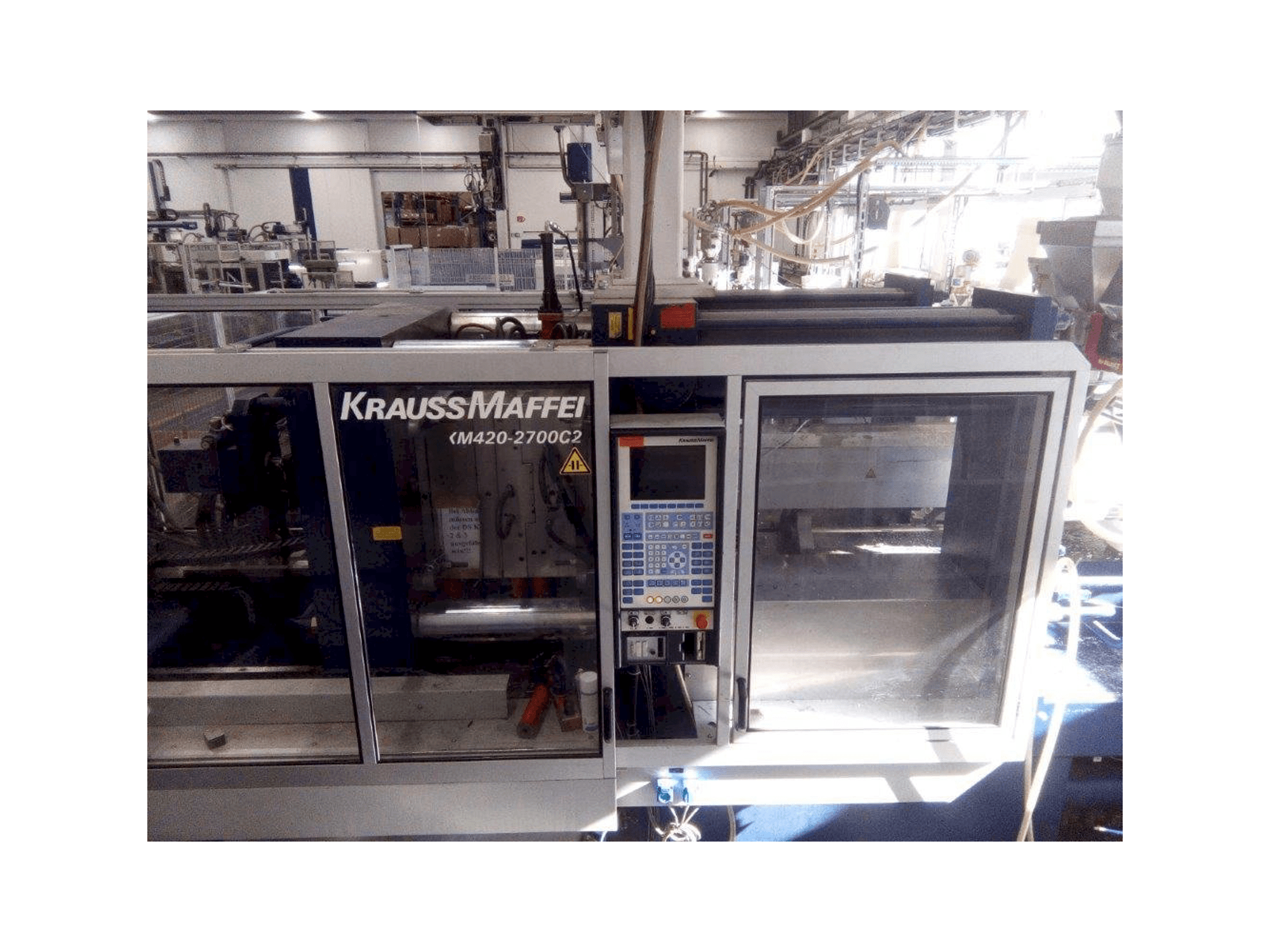 Vooraanzicht van Krauss Maffei KM 420/2700 C2 machine