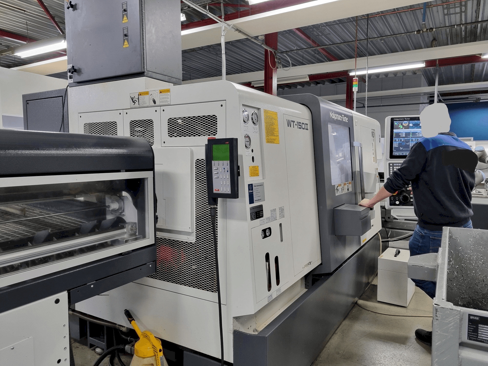 Vooraanzicht van NAKAMURA-TOME WT-150II machine