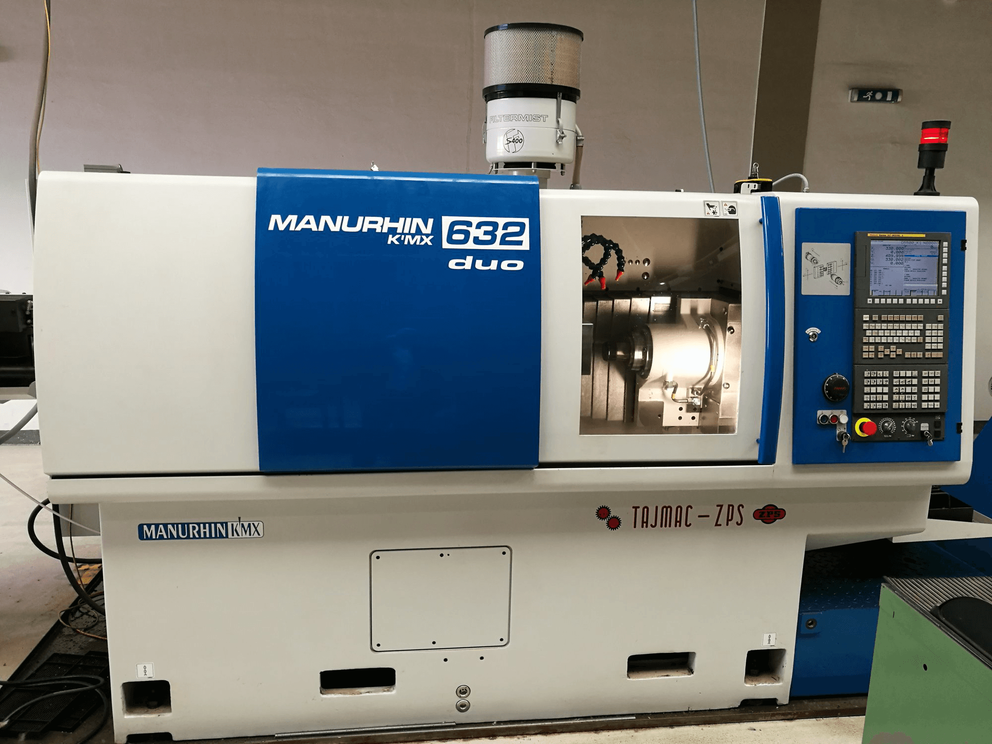 Vooraanzicht van TAJMAC-ZPS MANURHIN K'MX 632 DUO machine