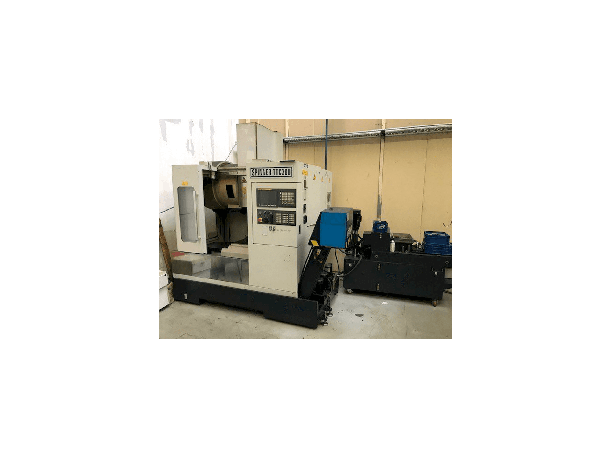 Vooraanzicht van SPINNER TTC300 52 SMMCY machine