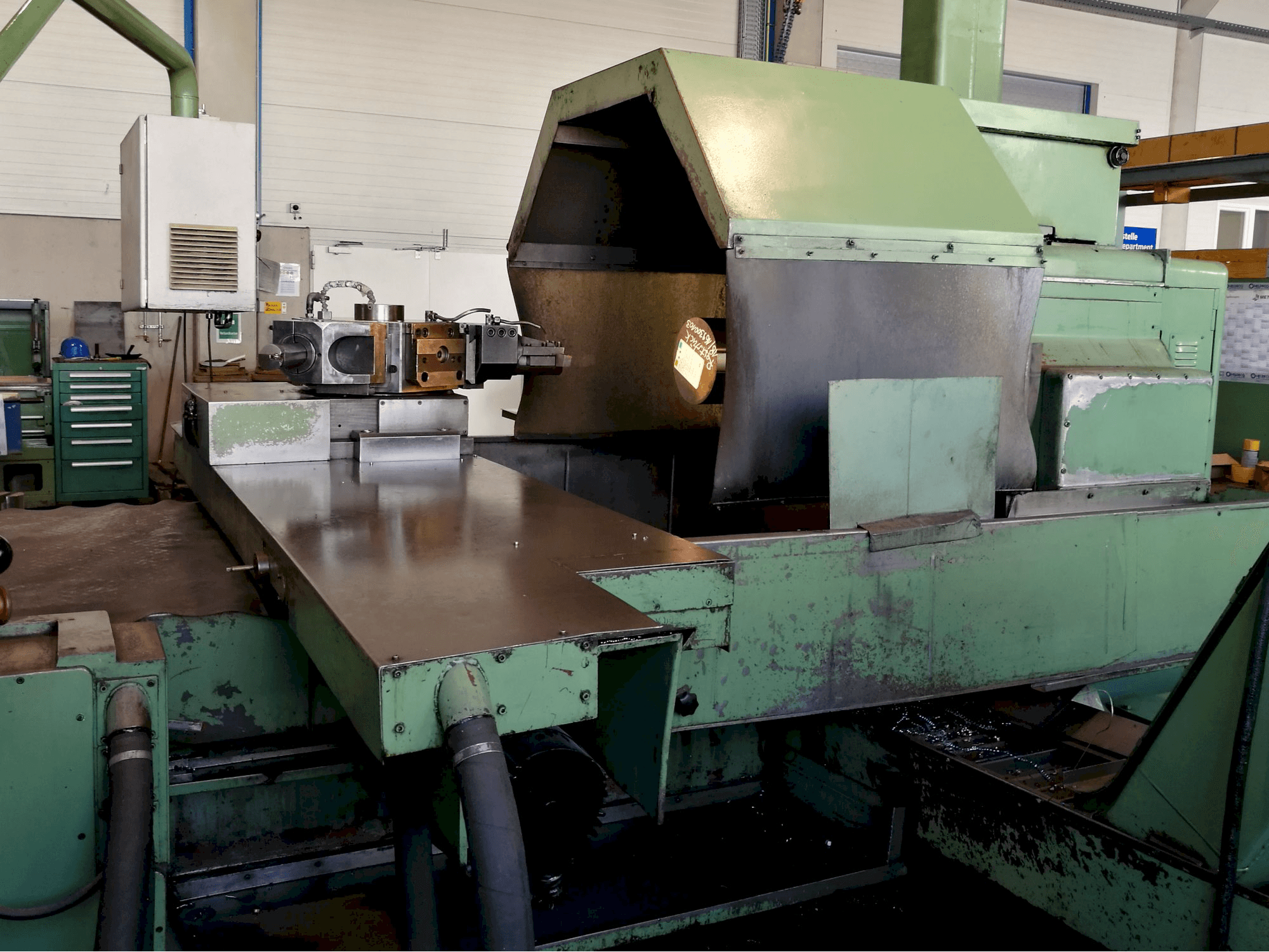 Rechts zijaanzicht van HEID DF NCC 1000 machine