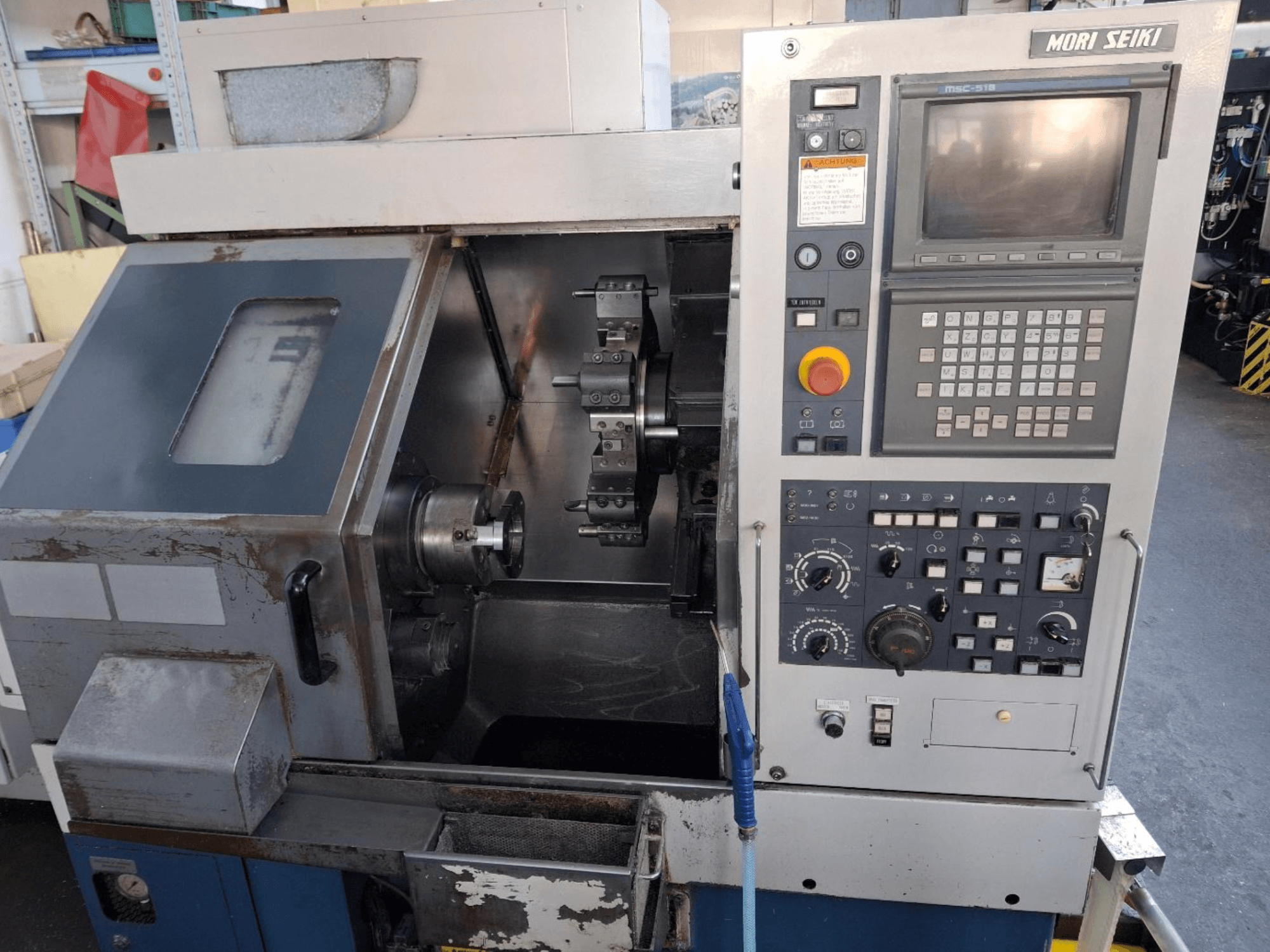 MORI SEIKI CL 15 horizontale draaimachine, vooraanzicht van bedieningspaneel en bewerkingsgebied.