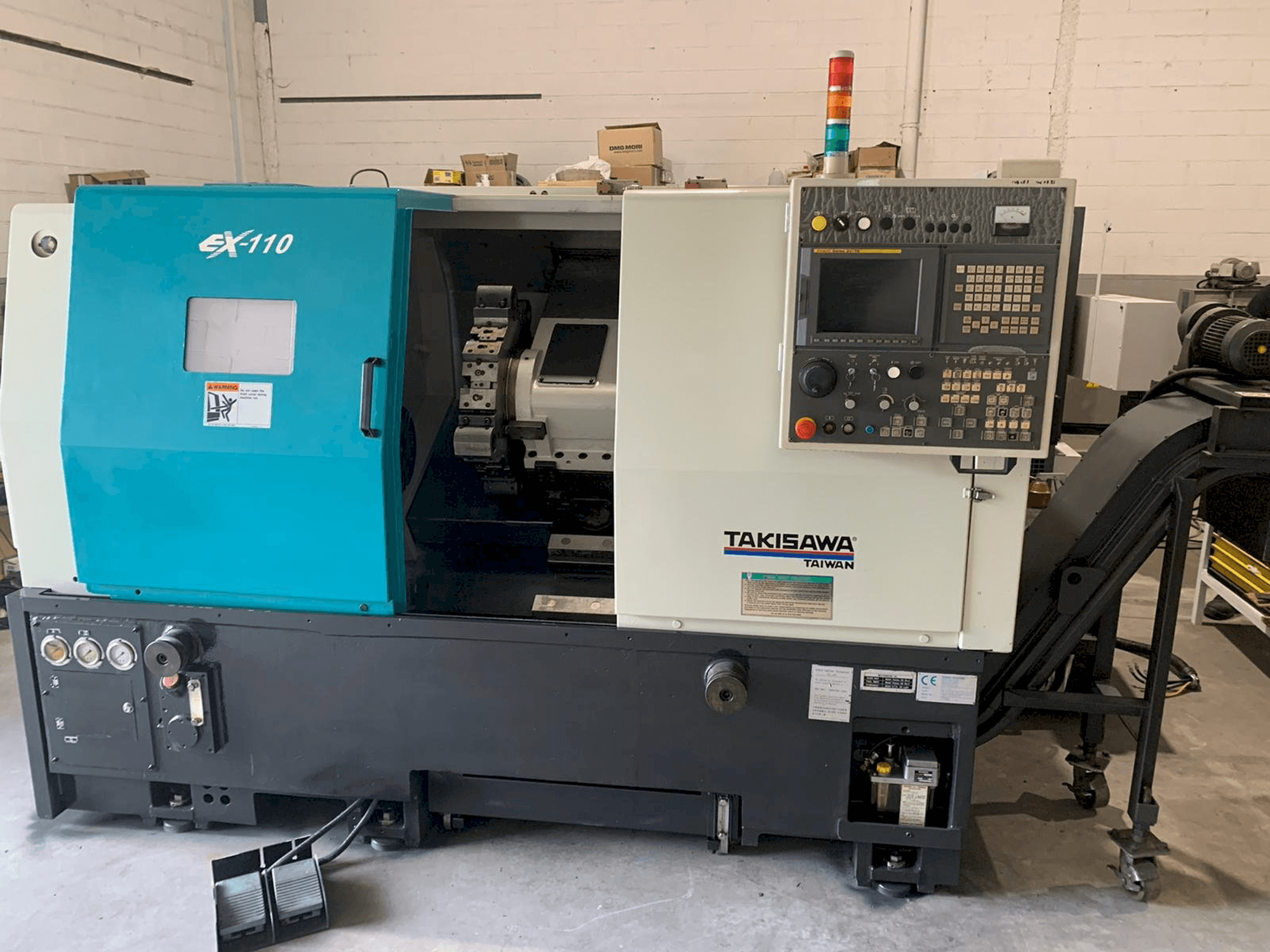 Vooraanzicht van Takisawa EX-110 machine