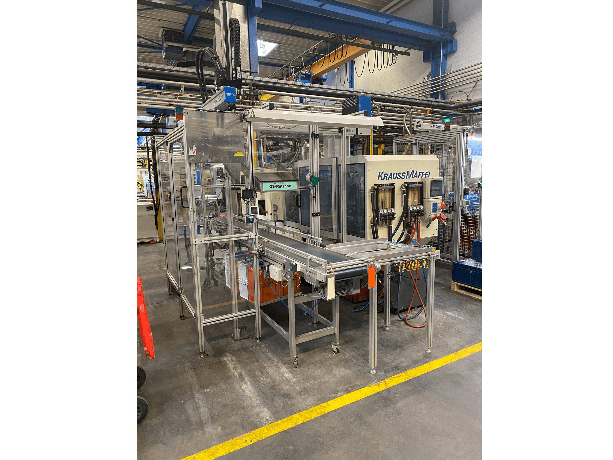 Vooraanzicht van Krauss Maffei 80-390 C2 machine