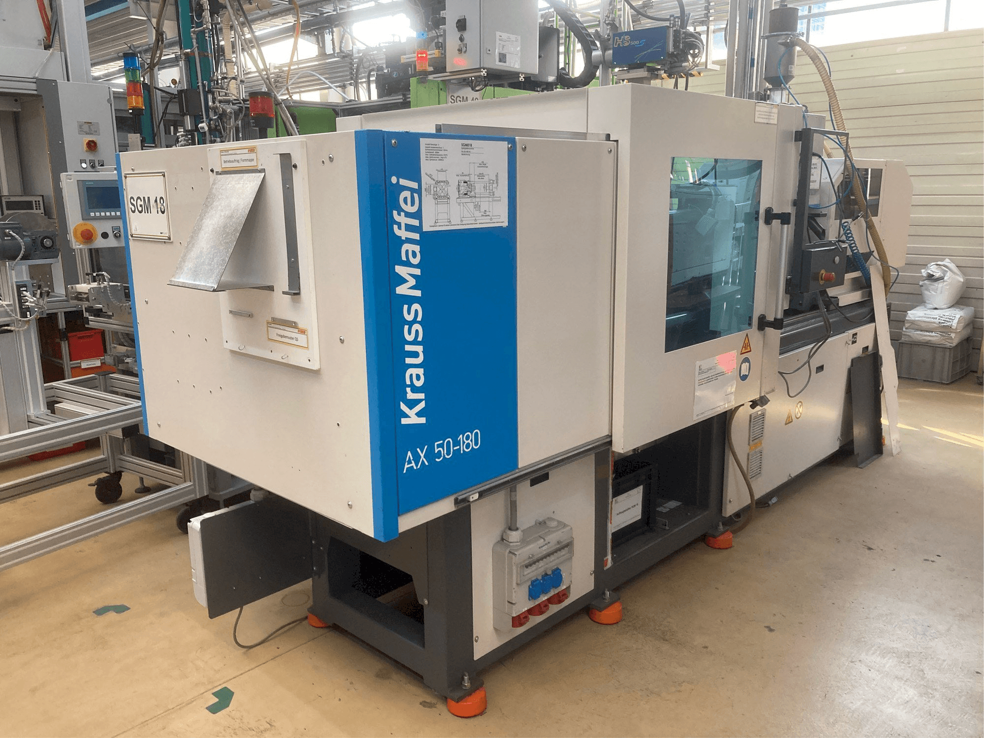 Linkerzijdeaanzicht van Krauss Maffei AX 50-180 machine