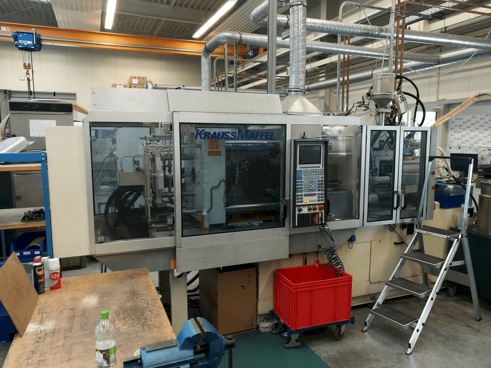 Vooraanzicht van Krauss Maffei 110-390/90 CZ machine