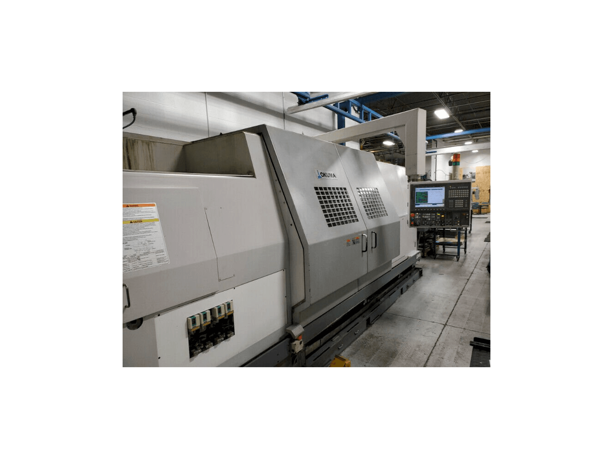 Linkerzijdeaanzicht van Okuma LB45 II machine