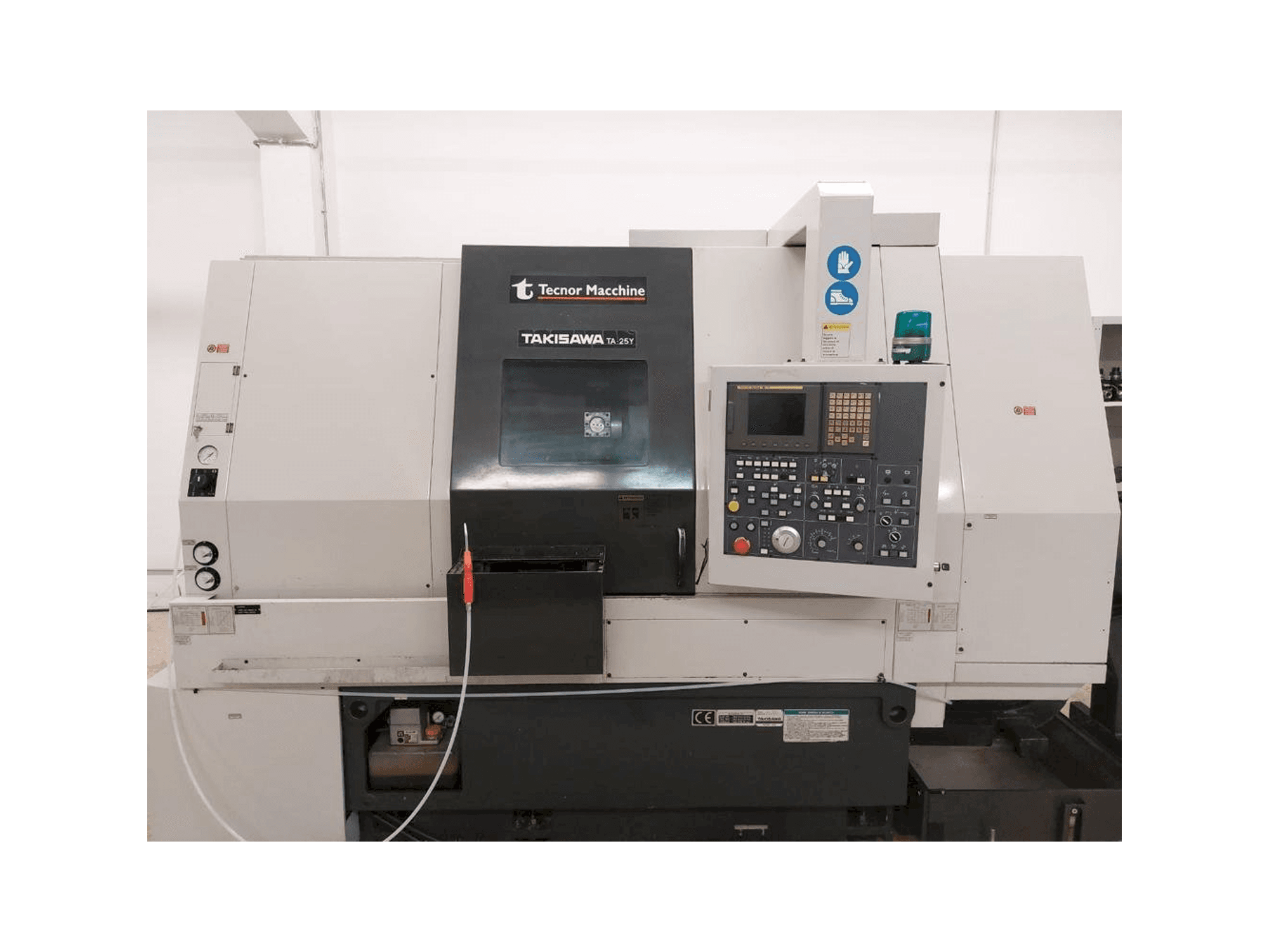 Vooraanzicht van Takisawa TA 25Y machine